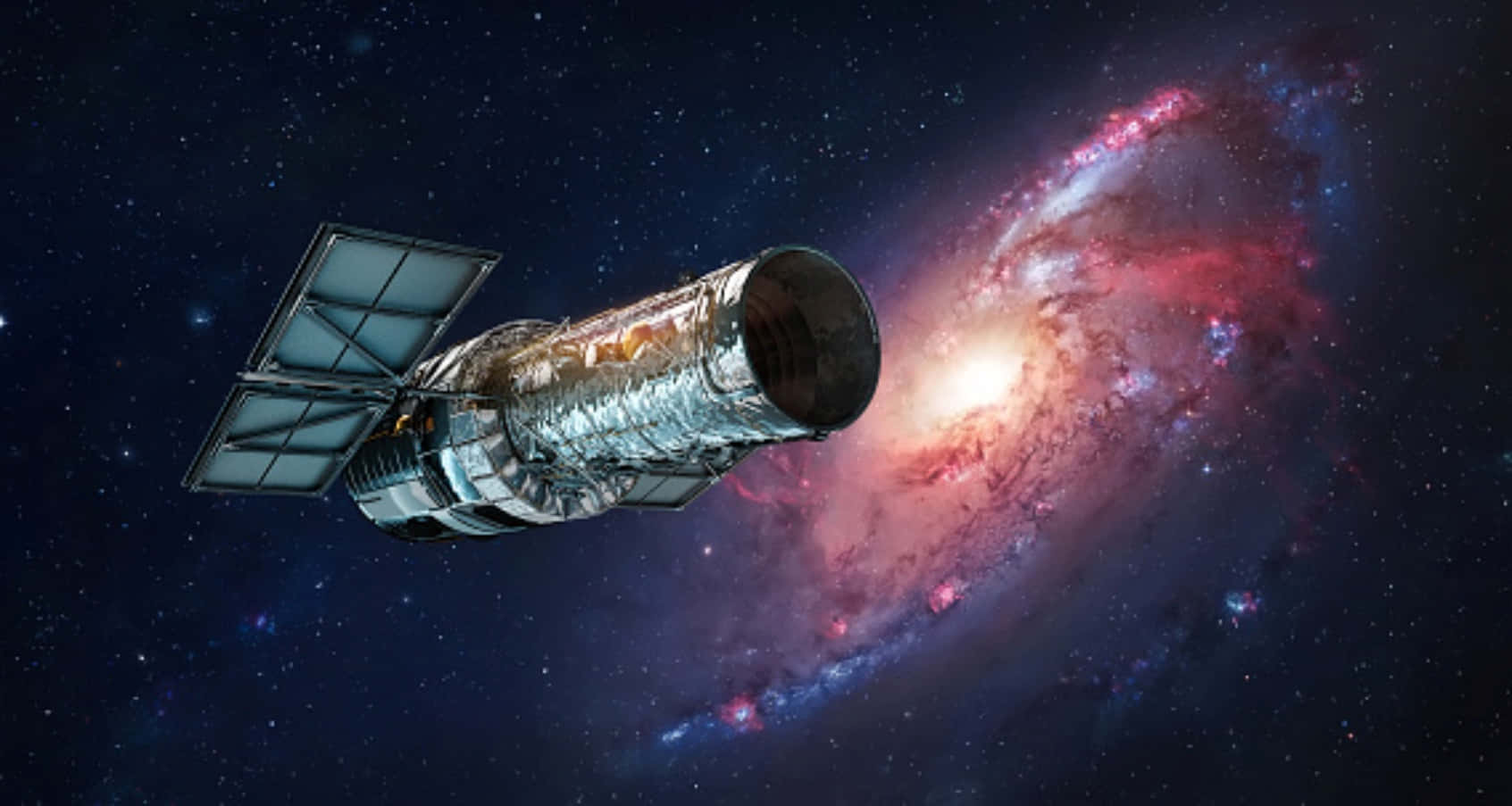 Hubble Space Telescope 桌布 壁紙 — 一個詳細的哈勃太空望遠鏡漂浮在深空中，對著一個散發紅光和藍光的鮮豔螺旋星系。