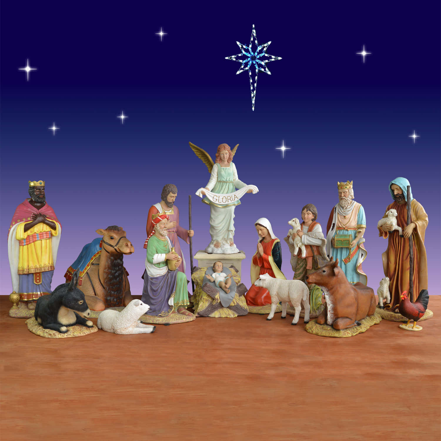 Nativity Scene 桌布 壁紙 — 一個詳細的耶穌誕生場景，包含瑪利亞、約瑟、嬰兒耶穌、天使、智者、動物以及上方閃耀的星星的雕像。