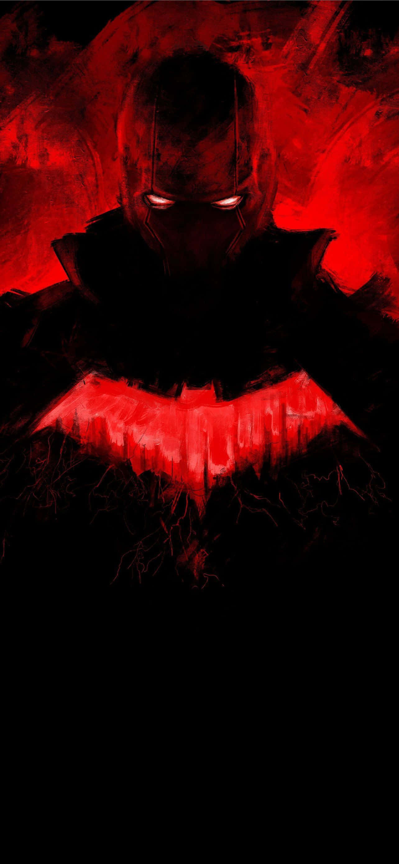 Batman Under The Red Hood 桌布 壁紙 — 一個身穿暗紅色裝甲服、眼睛發光、蝙蝠標誌發光的蝙蝠俠，背景是火紅色的。