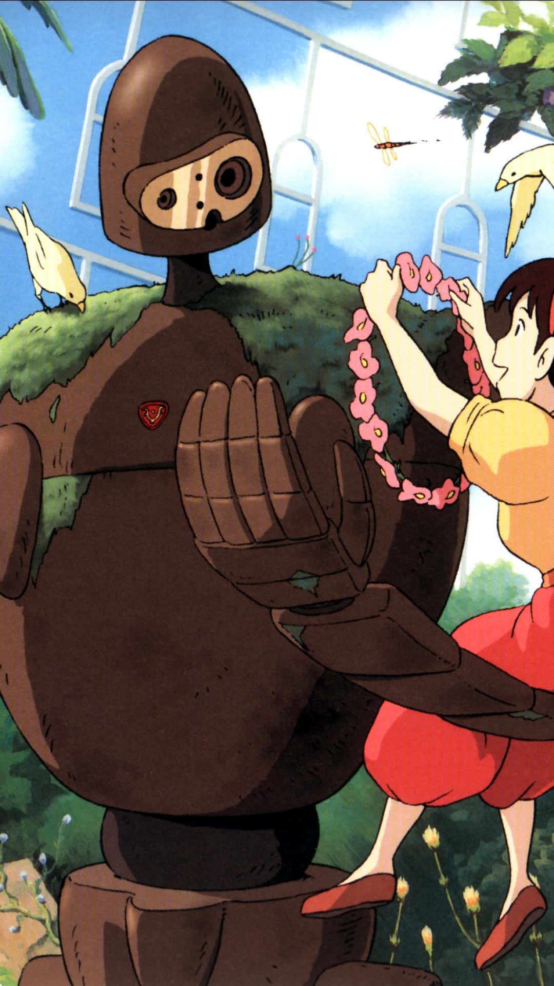 Laputa Castle In The Sky 桌布 壁紙 — 一個身穿紅黃衣服的小女孩，在藍天白雲、鳥兒飛翔的背景下，輕輕地將一條粉紅色花鏈掛在一個長滿苔蘚的棕色機械人脖子上。
