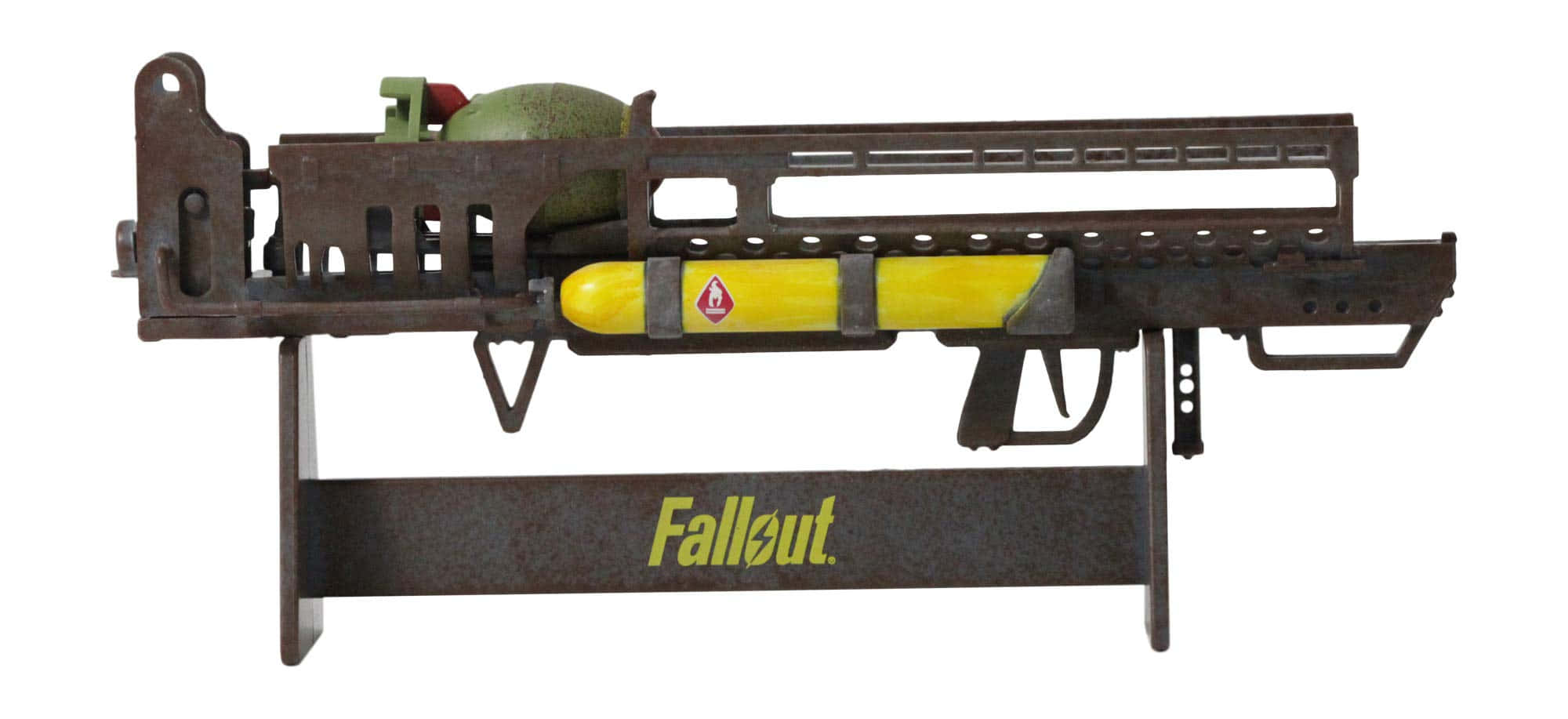 Fallout 4 Fat Man 桌布 壁紙 — 一個鏽蝕的Fallout榴彈發射器，帶有黃色榴彈，安裝在金屬支架上，背景為白色。