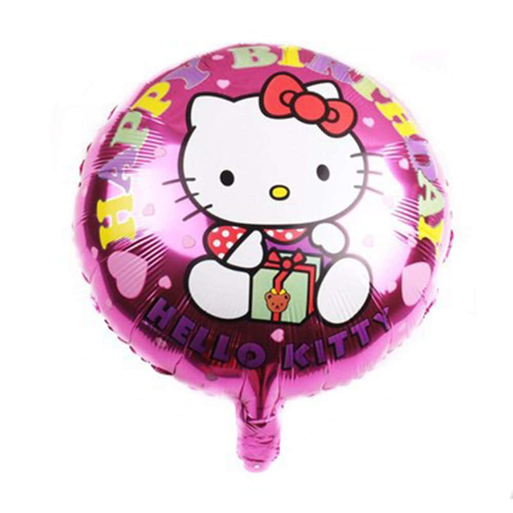 Hello Kitty Party 桌布 壁紙 — 一個閃亮的粉紅色箔氣球，上面有Hello Kitty拿著禮物，並有「Happy Birthday」文字和心形圖案。