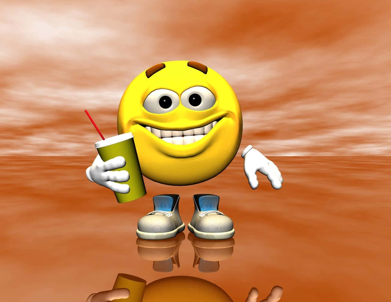 Smiley 桌布 壁紙 — 一個開心嘅黃色3D渲染表情符號角色，有手腳同鞋，喺溫暖嘅橙色漸變背景前拎住一個綠色飲品杯。