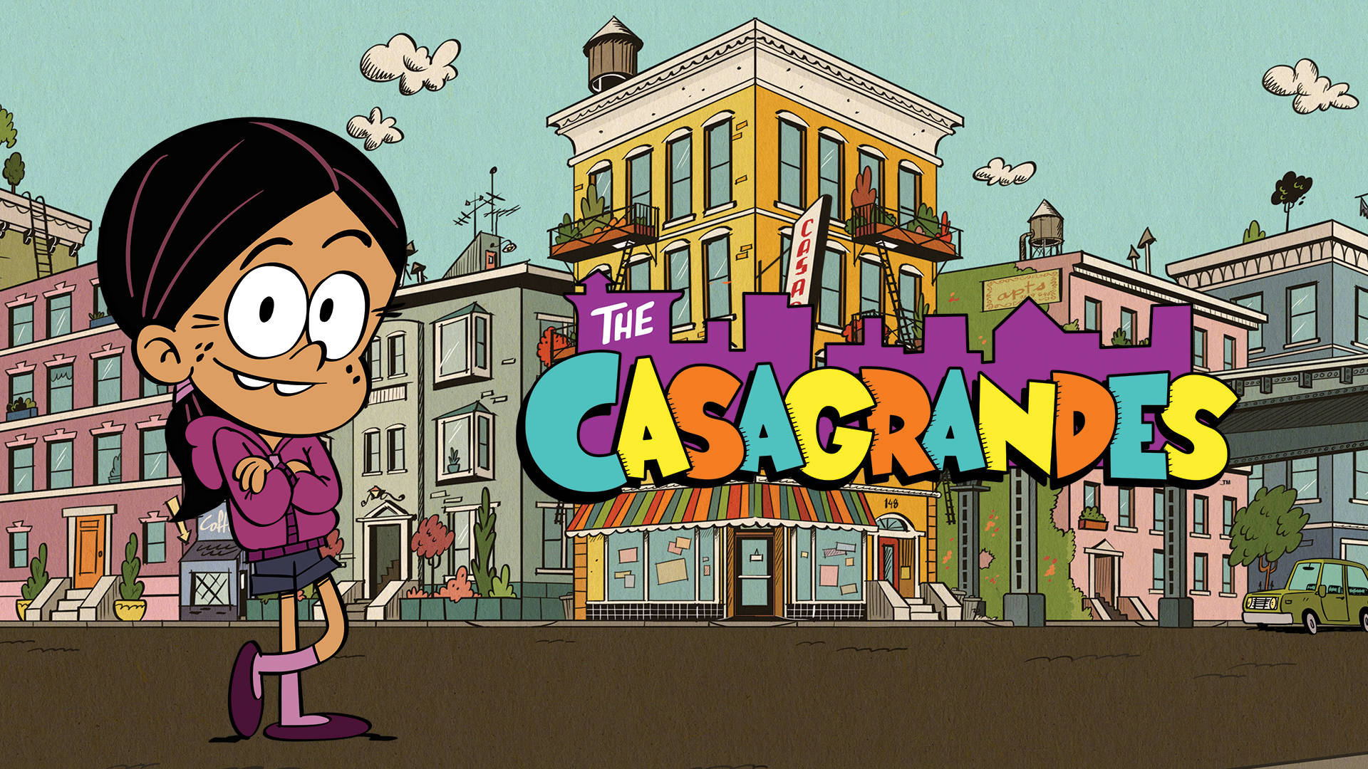 《The Casagrandes》Ronnie Anne Santiago 壁紙 — 一個開心的卡通女孩自豪地站在一棟色彩繽紛的城市建築前，上面有'The Casagrandes'標題。