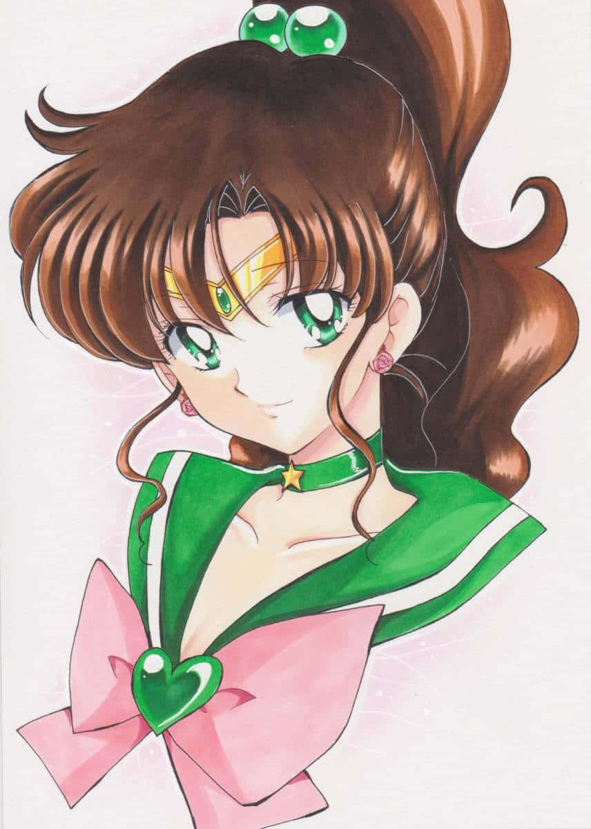 sailor jupiter 桌布 壁紙 — 一個開朗的動漫女孩，棕色頭髮，綠色眼睛，穿著綠色和粉紅色的水手服，配有心形蝴蝶結。