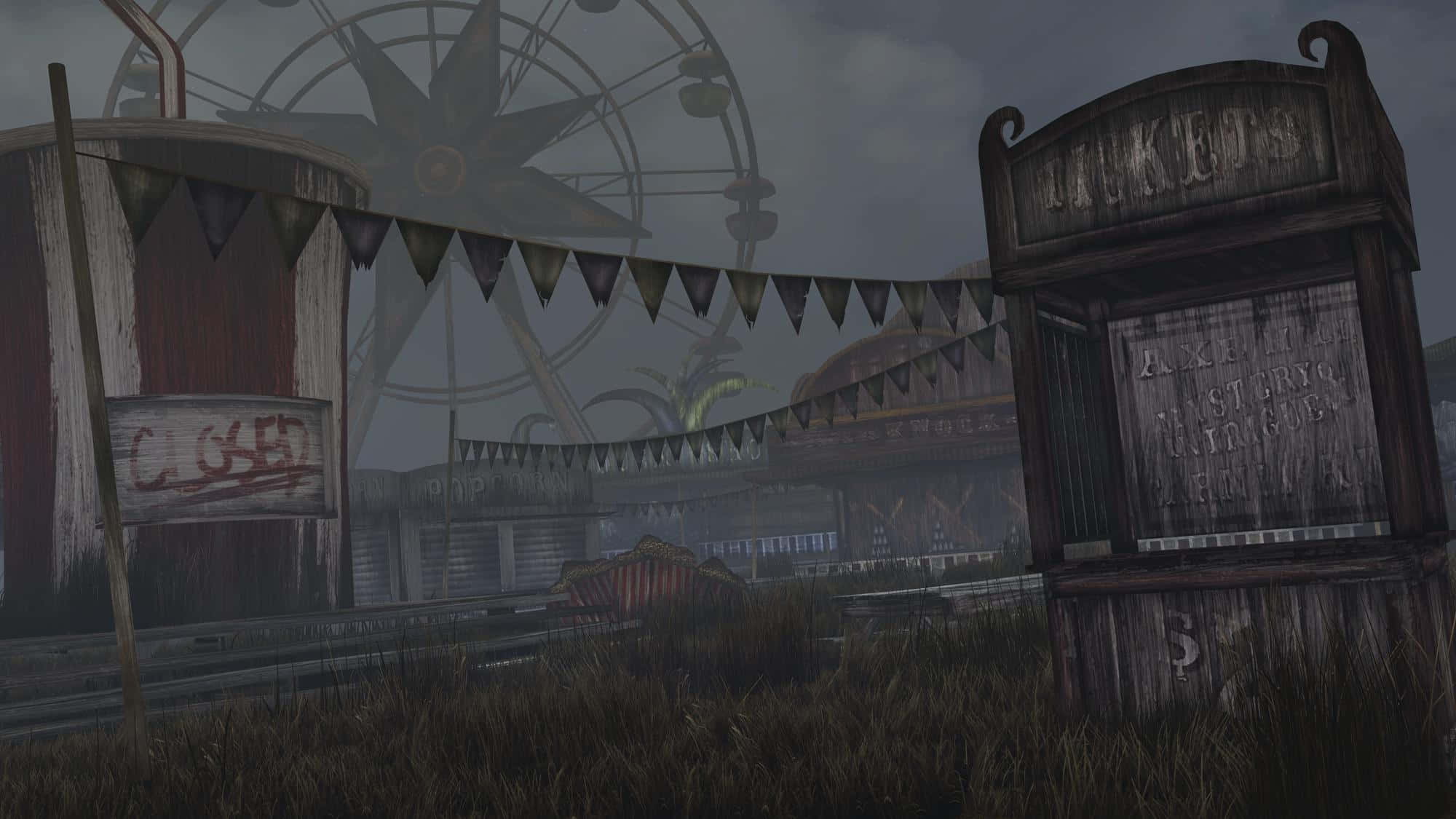 Dark Carnival 桌布 壁紙 — 一個陰森荒廢、雜草叢生的遊樂園，生鏽的摩天輪和破爛的售票亭在陰沉天空下。