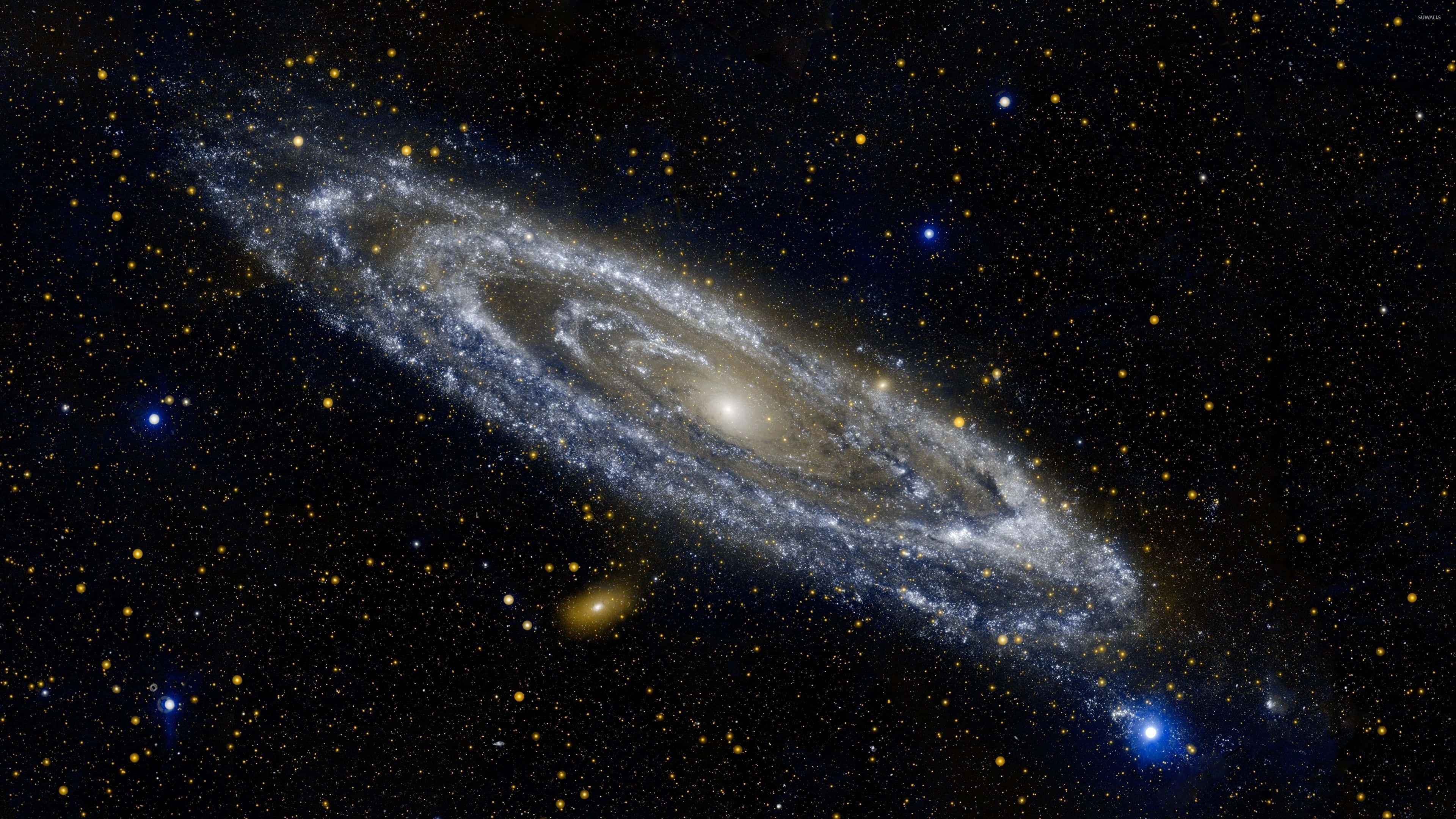 Whirlpool Galaxy 桌布 壁紙 — 一個雄偉的螺旋星系，其旋臂由恆星和宇宙塵埃組成，在星空的背景下閃耀。