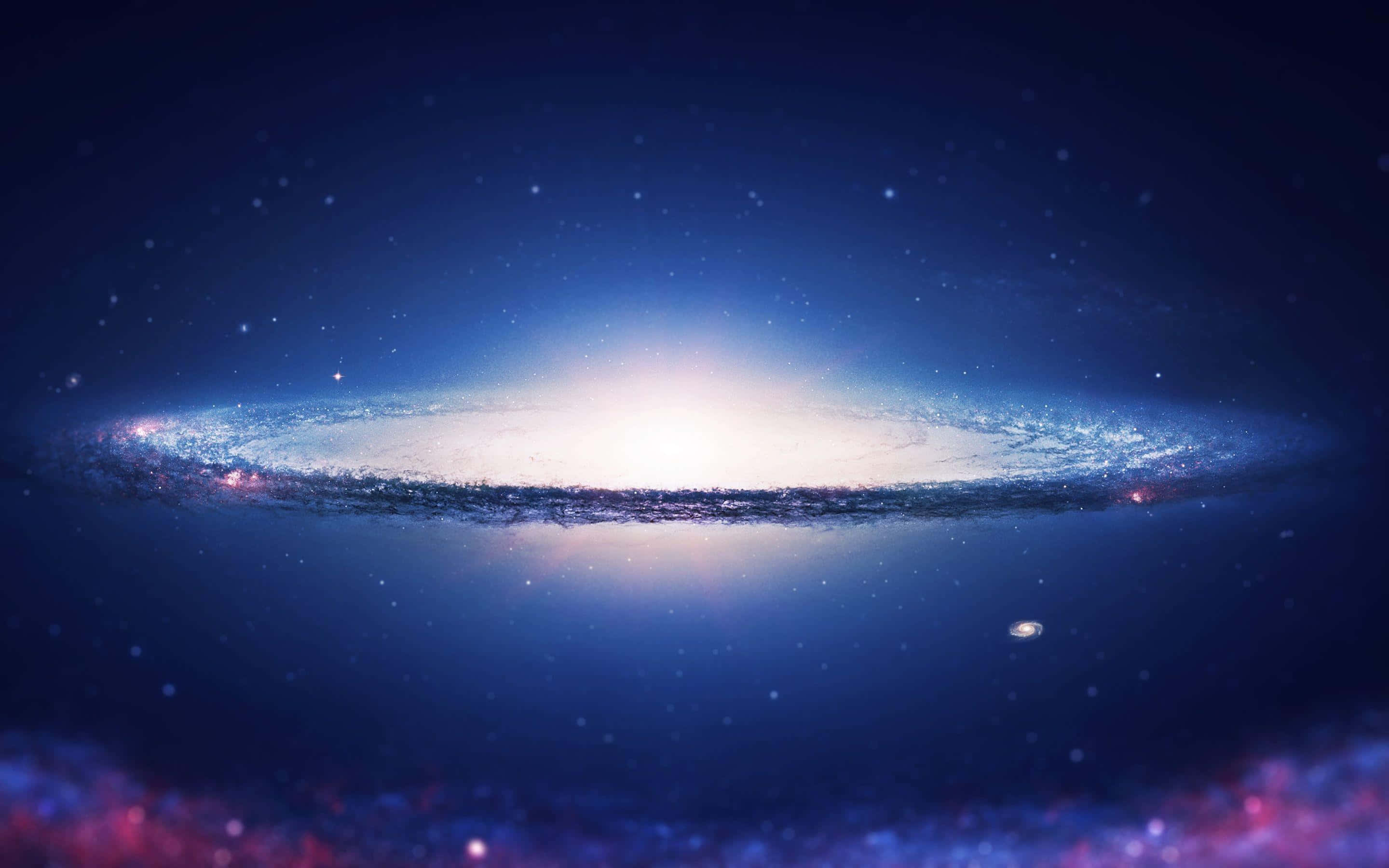 Quasar 桌布 壁紙 — 一個雄偉的螺旋星系在深邃的宇宙背景下閃耀著藍色和白色的光芒，背景點綴著星星。