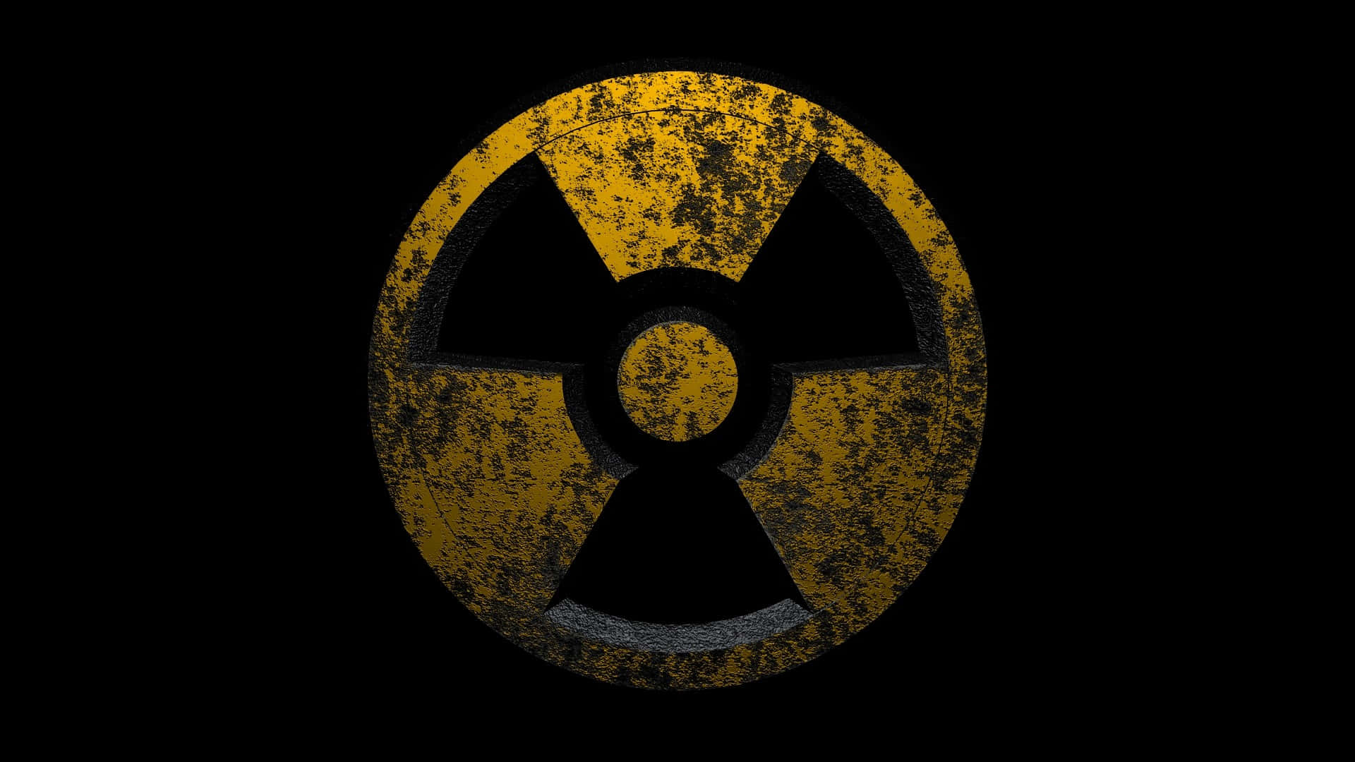 Fallout Nuke 桌布 壁紙 — 一個風化的黃色和黑色放射性標誌在純黑色背景上顯得格外突出。