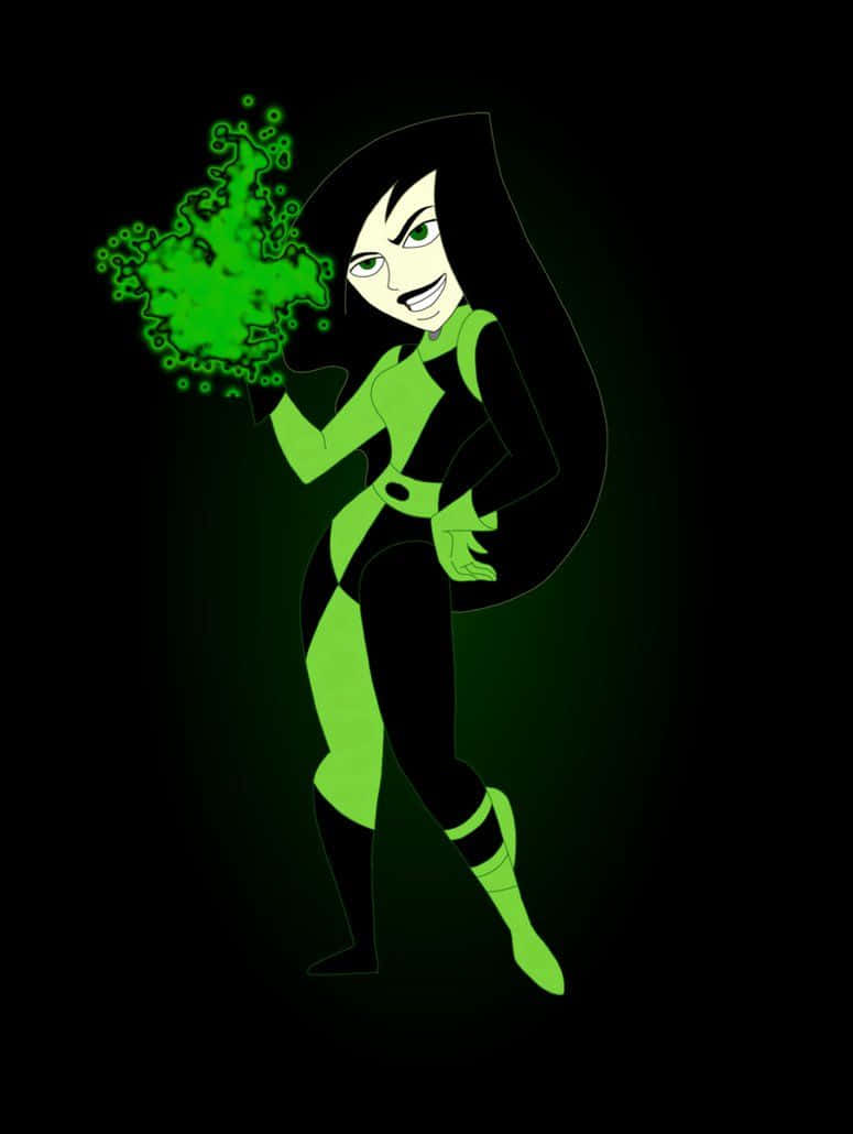 kim possible 桌布 壁紙 — 一個風格化的動漫女孩，長長的黑髮和綠色發光套裝，在黑暗背景中拿著一個冒泡的綠色能量球。