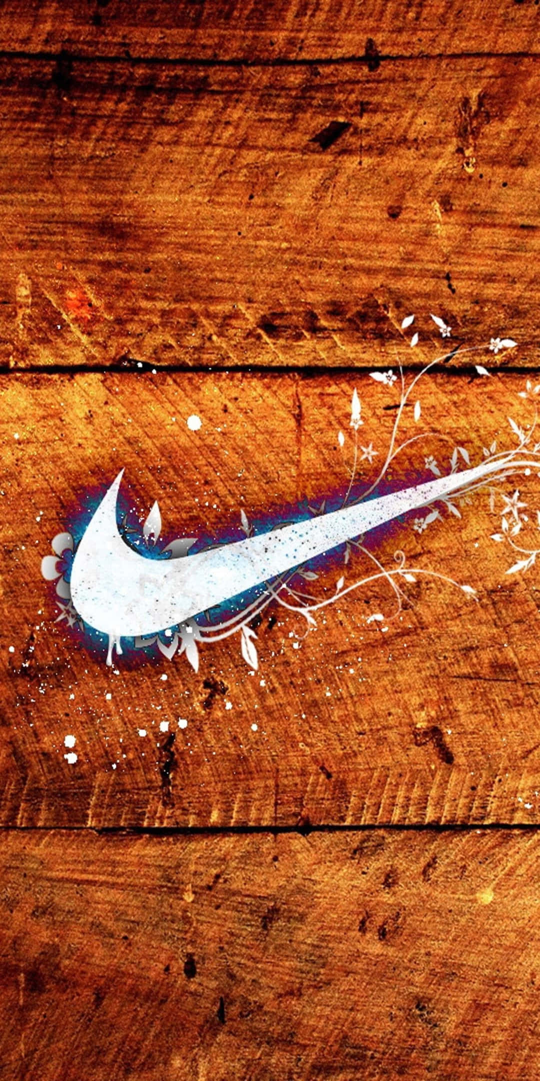 1. 壁紙 — 一個風格化的白色Nike剔號，帶有花卉枝條和油漆飛濺，放置在風化的木質表面上。