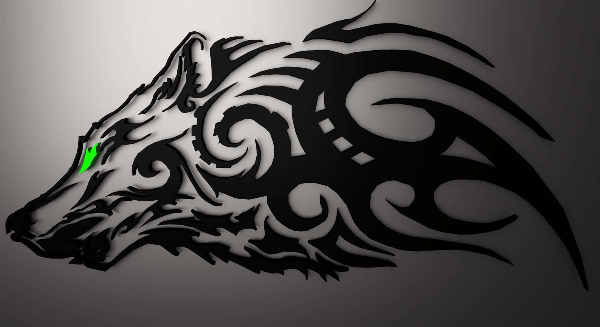 Tribal Wolf 桌布 壁紙 — 一個風格化的黑色部落狼頭，帶有發光的綠色眼睛，背景為漸變灰色。