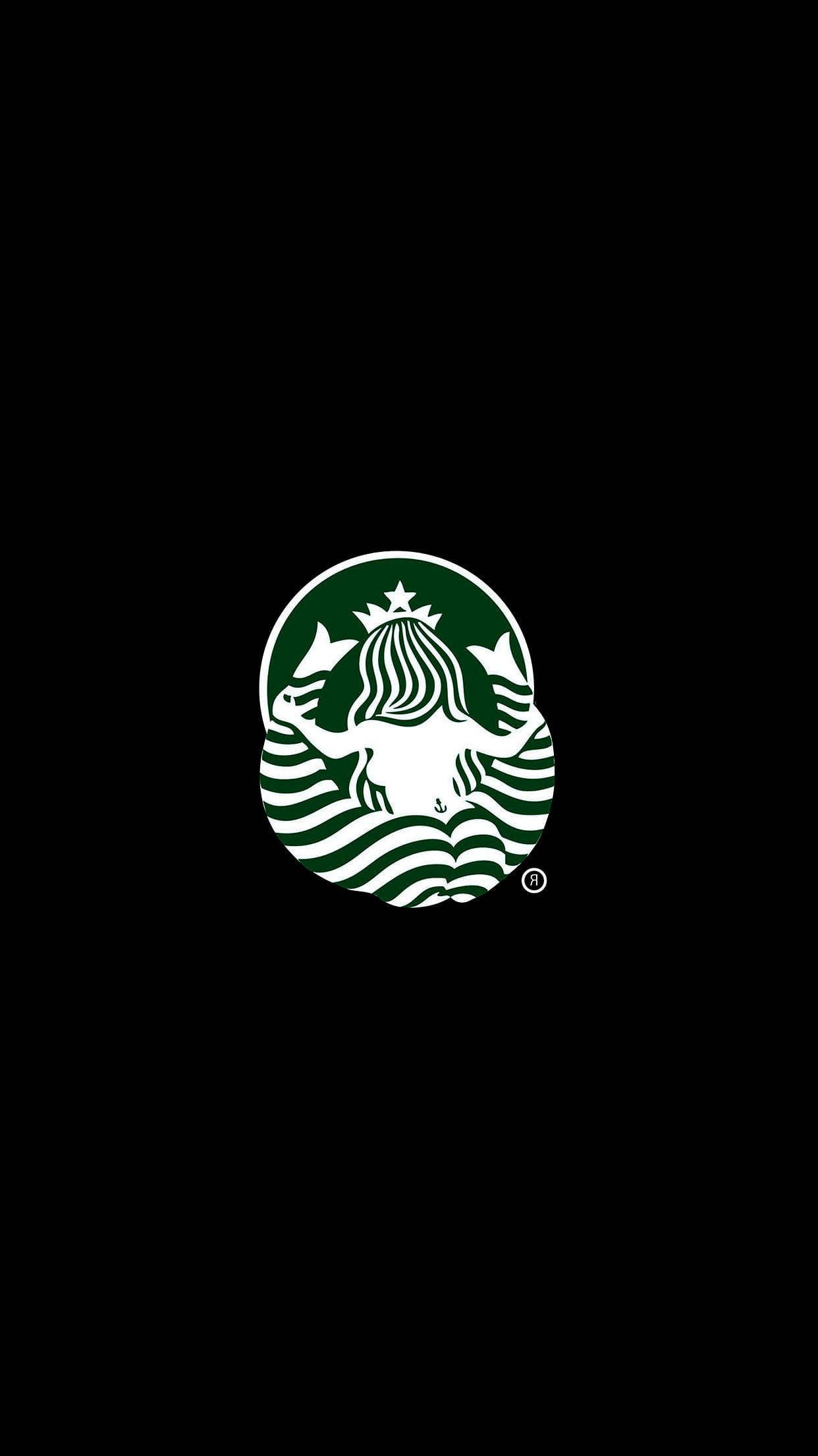 星巴克 桌布 壁紙 — 一個鮮明的白色Starbucks海妖標誌，居中放在純黑色背景上，帶有醒目的綠色點綴。