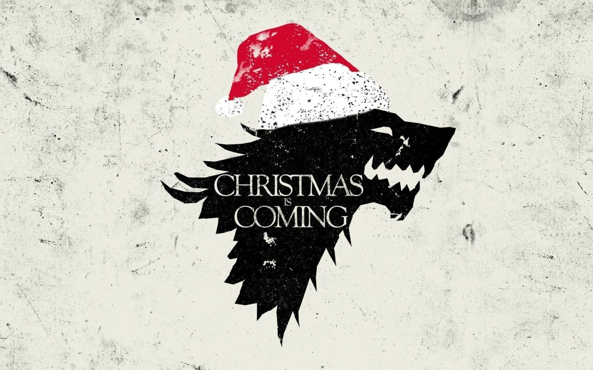 Christmas Movie 桌布 壁紙 — 一個鮮明的黑色冰原狼剪影，戴著紅白相間的聖誕帽，配上「Christmas is Coming」文字，背景為仿舊的米白色。