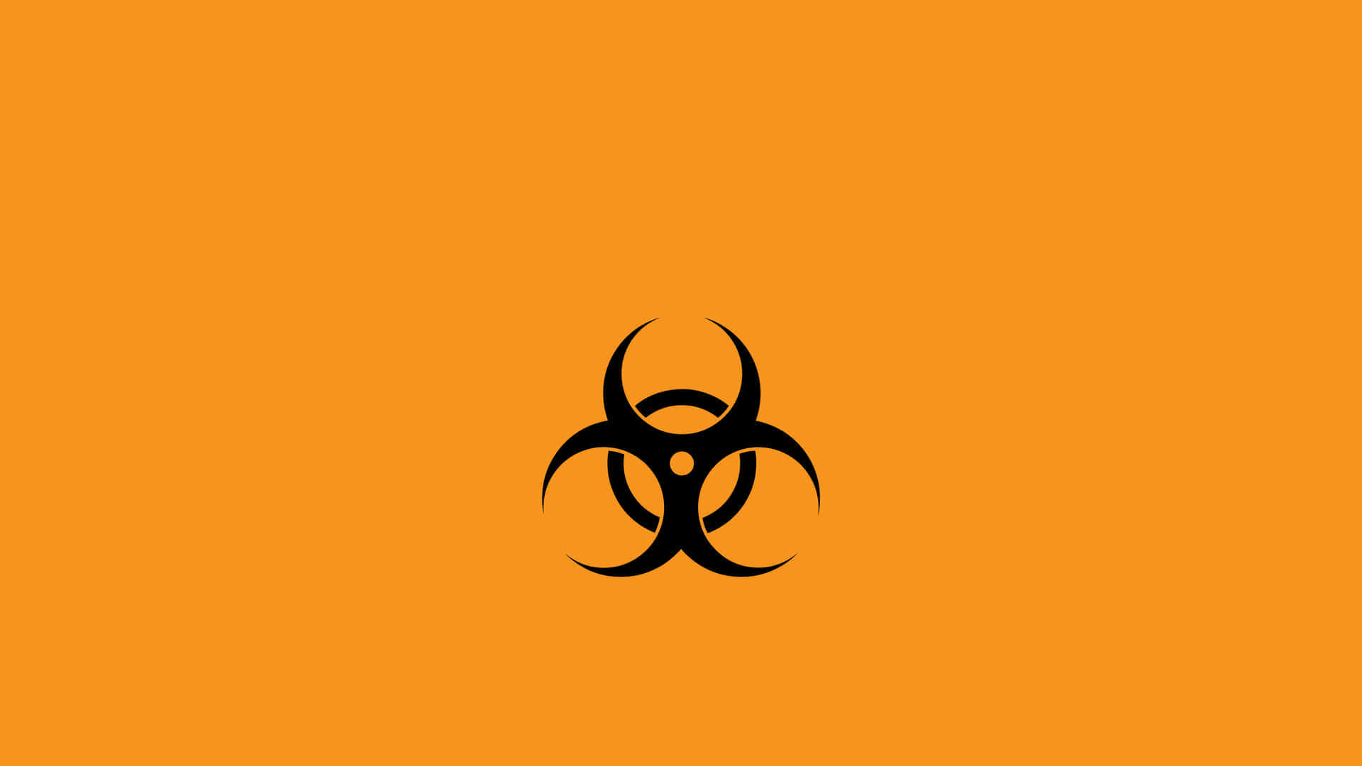 toxic 桌布 壁紙 — 一個鮮明的黑色生物危害標誌居中於純橙色背景上。