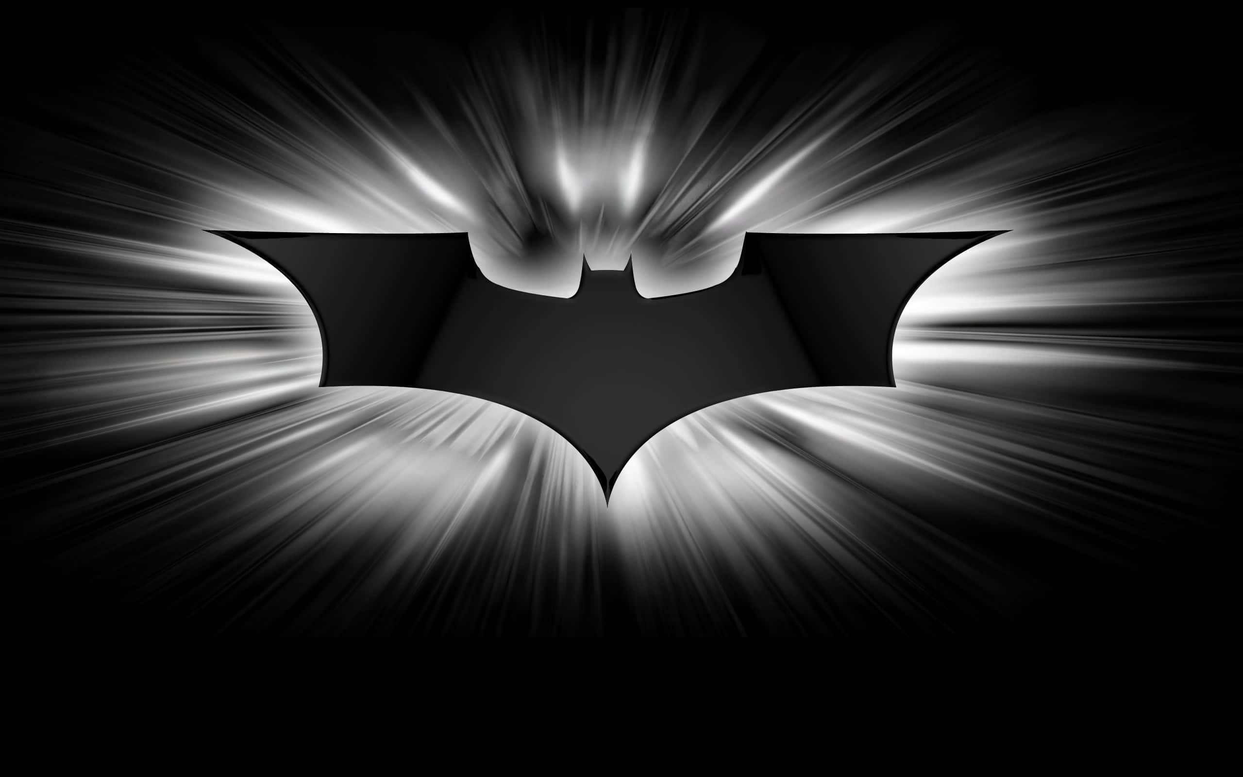 bat 桌布 壁紙 — 一個鮮明的黑色蝙蝠標誌在純黑色背景上散發出明亮的白色光線。