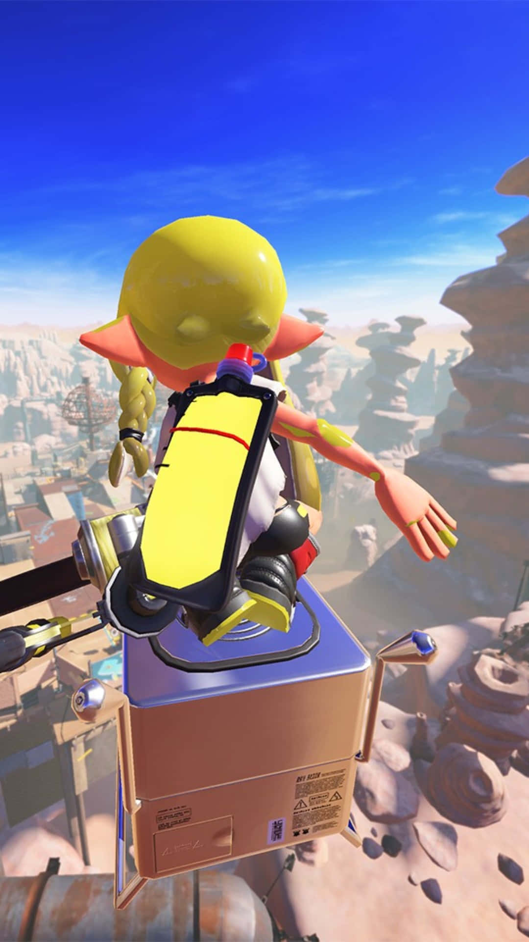 splatoon 桌布 壁紙 — 一個黃頭 Inkling 喺晴朗藍天下，用噴射背包滑翔過一個有岩石地貌嘅沙漠峽谷。