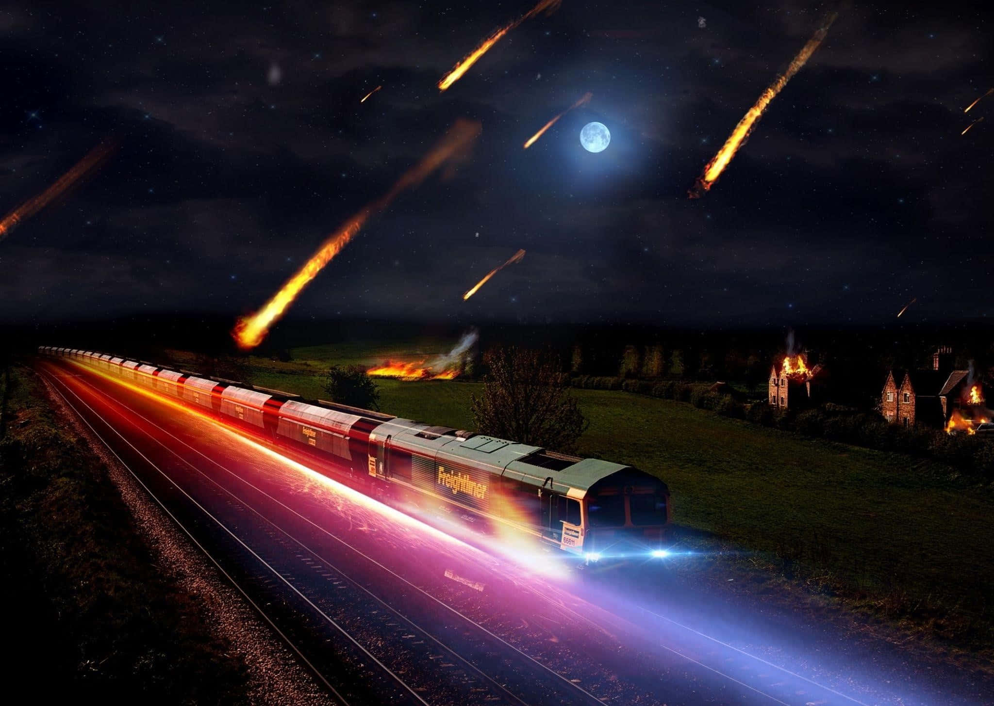 Asteroid 桌布 壁紙 — 一列 Freightliner 火車在繁星點點的夜空下，伴隨著流星和發光的月亮，疾馳過燃燒的鄉村。