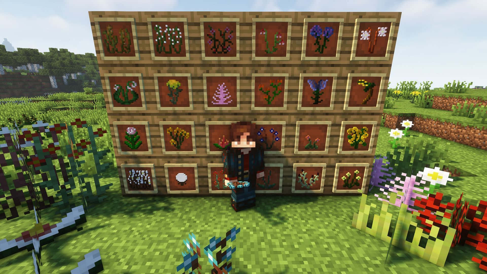 Minecraft Mods 桌布 壁紙 — 一名Minecraft玩家站在一面大牆前，牆上展示著像素化的植物和花朵樣本，背景是充滿活力的草地。