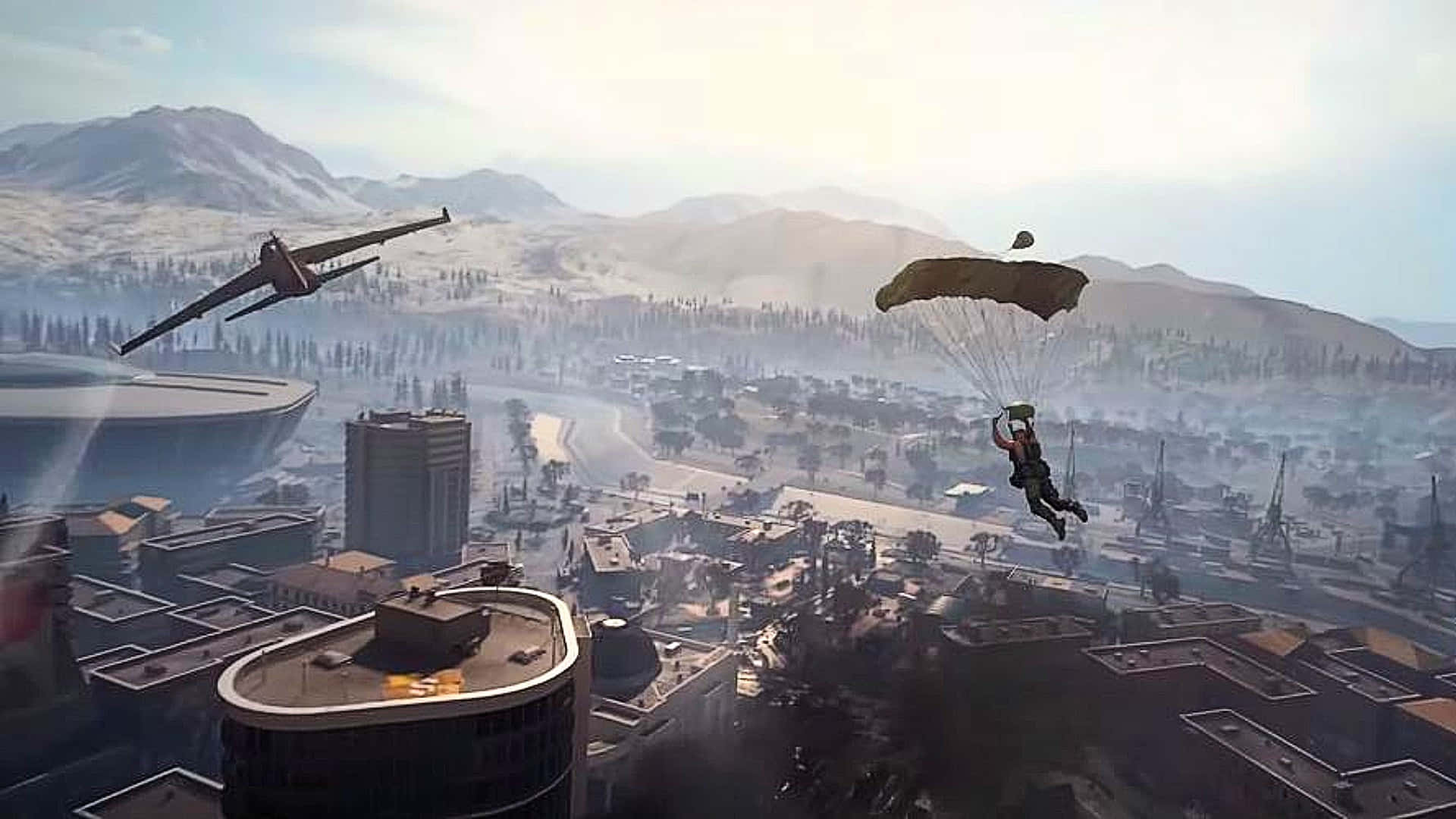 Call Of Duty Battles 桌布 壁紙 — 一名士兵喺戰爭摧殘嘅城市景觀上空跳傘，天空中有雪山同損壞嘅飛機。