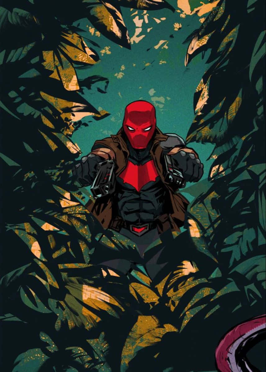 Batman Under The Red Hood 桌布 壁紙 — 一名戴紅色面具的義警從茂密的叢林樹葉中出現，手持兩把手槍，處於緊張的對峙狀態。