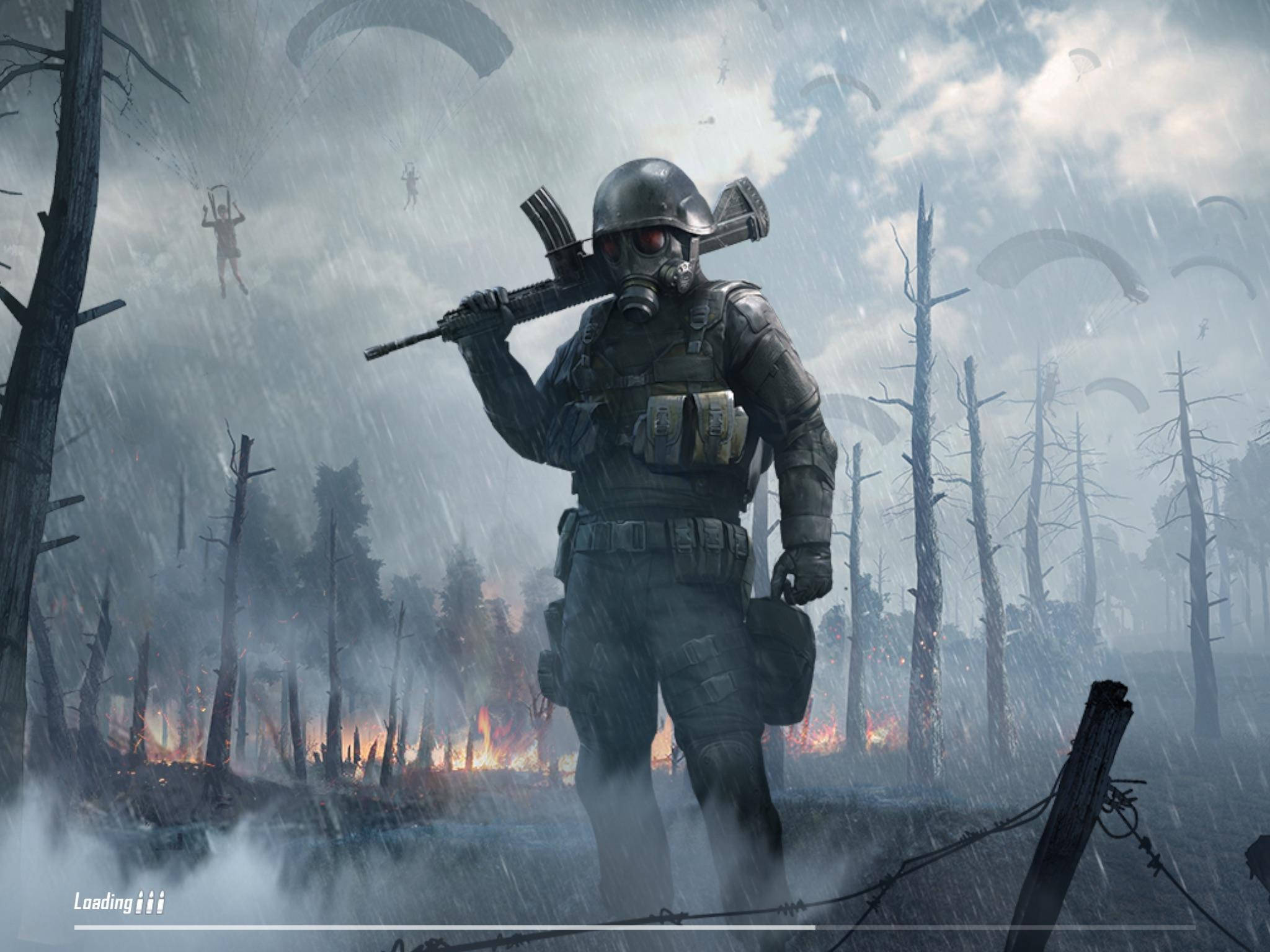 Playerunknown's Battlegrounds 桌布 壁紙 — 一名戴著防毒面具和戰鬥裝備的士兵站在被雨水浸濕、燃燒的森林中，降落傘從暴風雨的天空中降下。