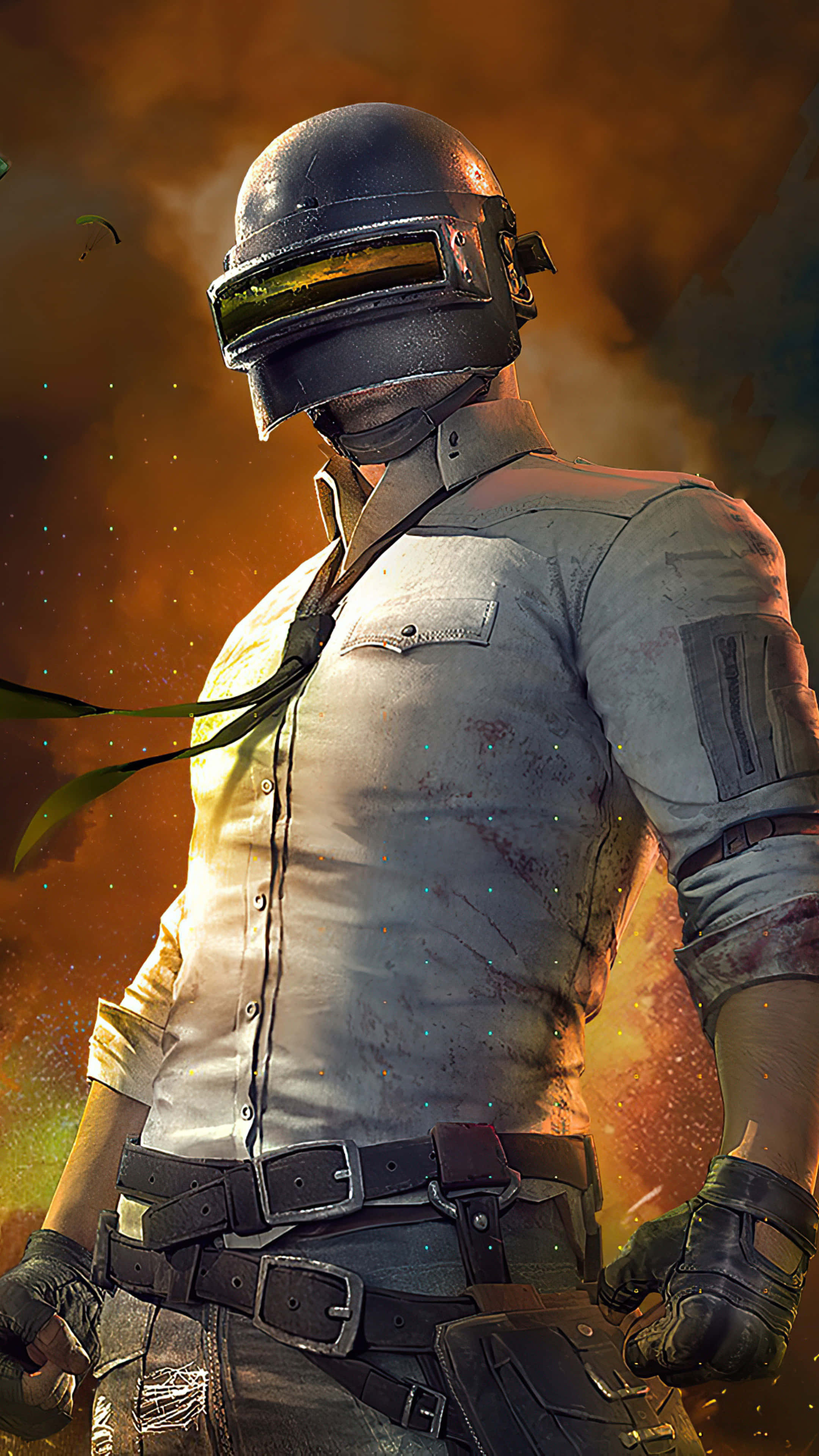 PUBG 桌布 壁紙 — 一名戴著頭盔、身穿血跡斑斑襯衫的士兵，站在熾熱的橙色天空下，周圍有發光的粒子。