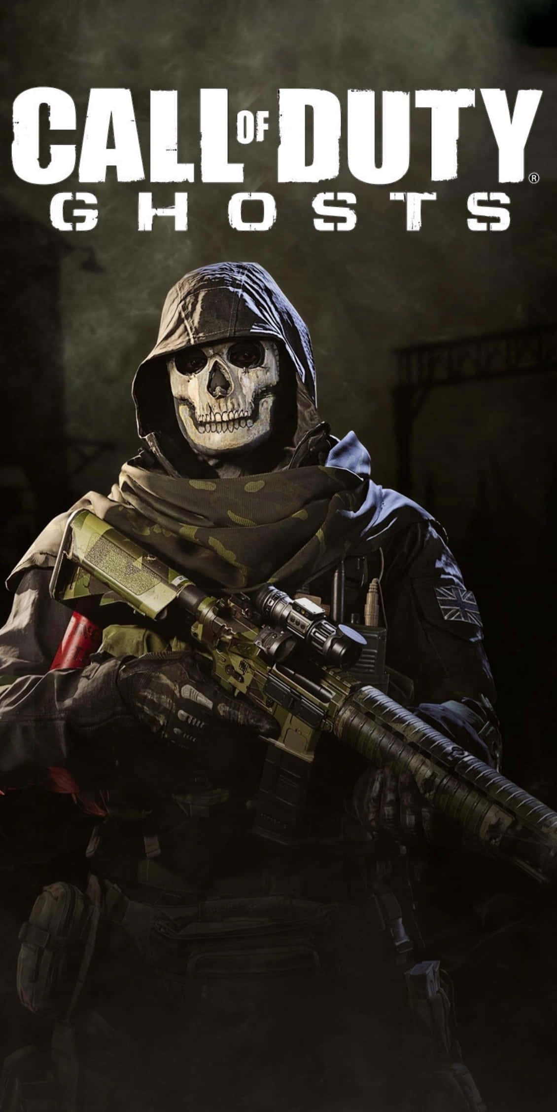 Call Of Duty Ghosts 桌布 壁紙 — 一名戴著骷髏面具的士兵身穿戰術裝備，在黑暗煙霧彌漫的戰場背景下手持步槍，並帶有遊戲標題文字。