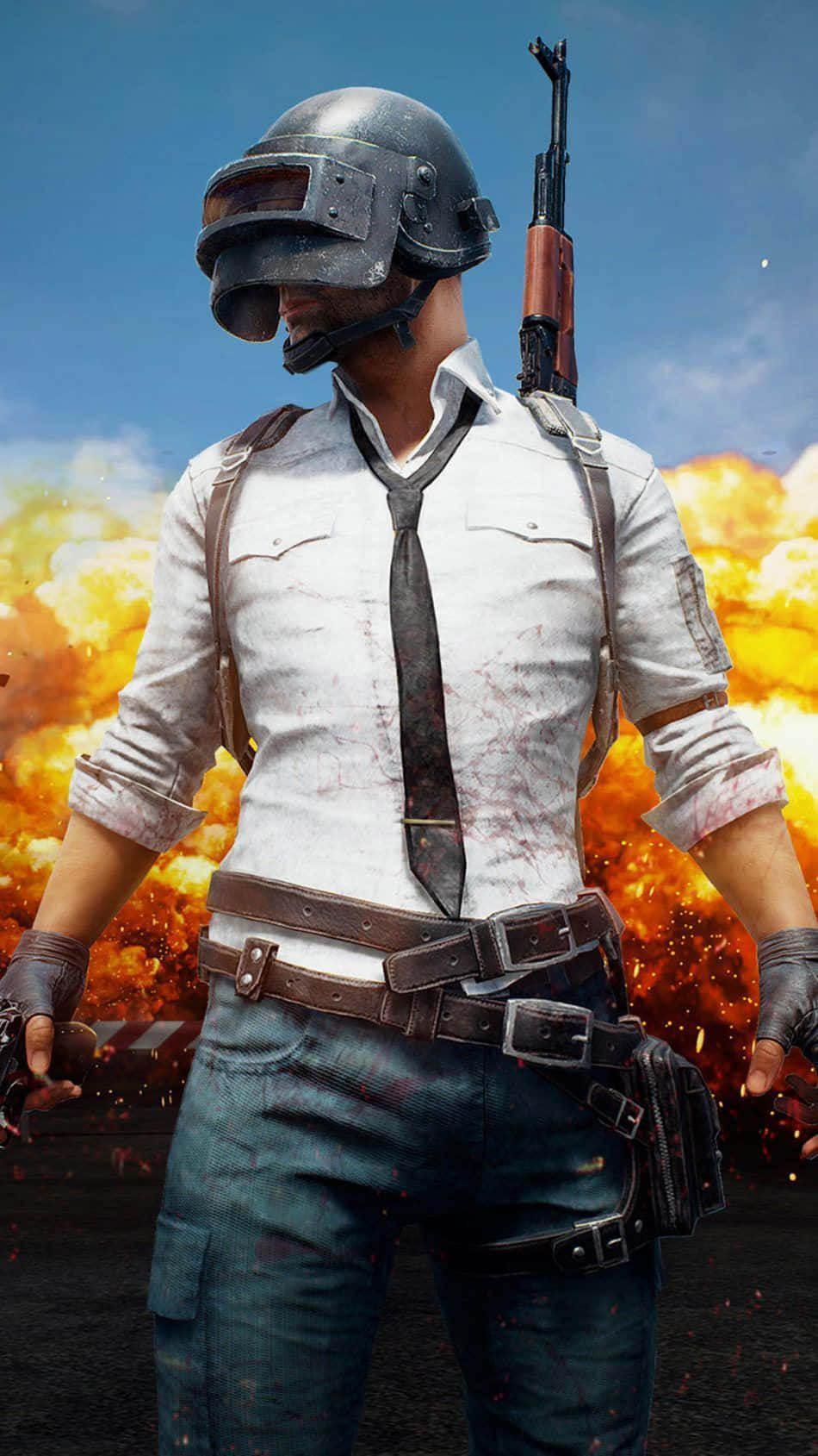 pubg mobile 桌布 壁紙 — 一名戴頭盔和領帶的士兵站在火熱的爆炸中，手持步槍，背景是藍天。