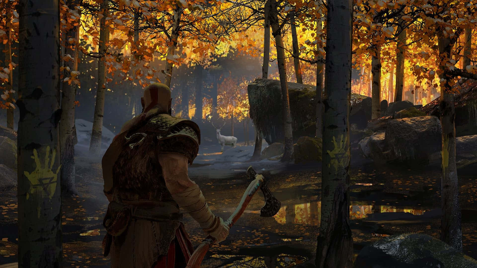 God Of War 桌布 壁紙 — 一名手持斧頭的戰士走過迷霧籠罩的秋日森林，金色的樹葉在漸暗的光線中閃耀。