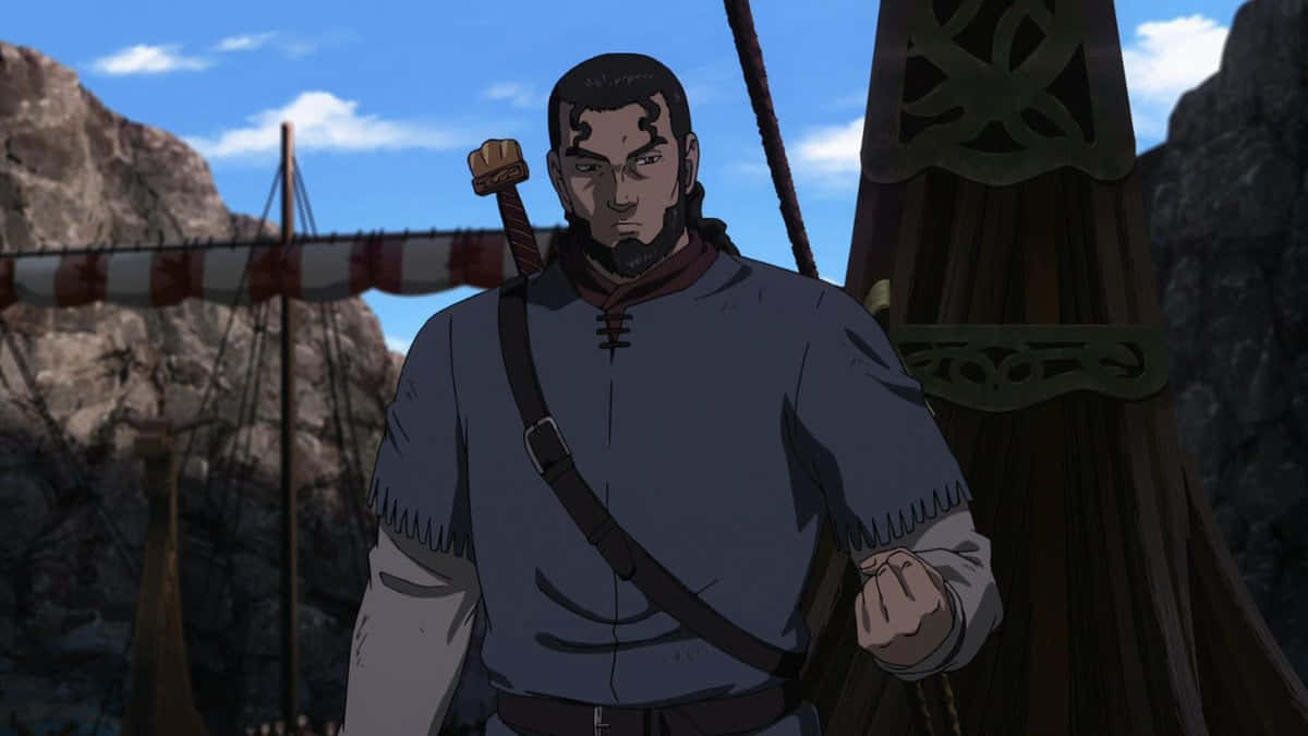 一名身穿中世紀服裝的男人站在船前 壁紙