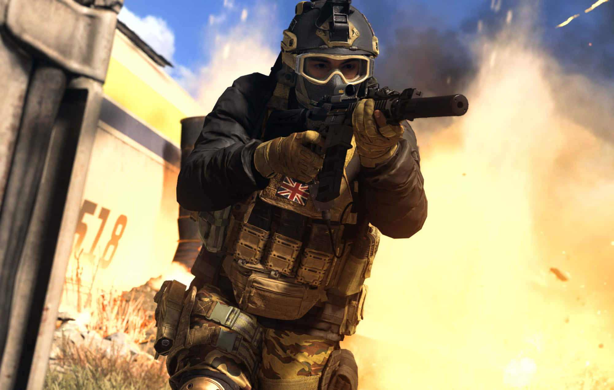 Call Of Duty Battles 桌布 壁紙 — 一名身穿全套戰術裝備的士兵在明亮的爆炸中開火，煙霧和碎片飛揚。