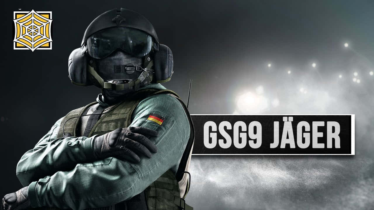 Rainbow Six Siege Jager 桌布 壁紙 — 一名身穿全套戰術裝備的德國GSG9 Jäger特種部隊士兵，在煙霧彌漫的戰場背景下自信地交叉雙臂站立。