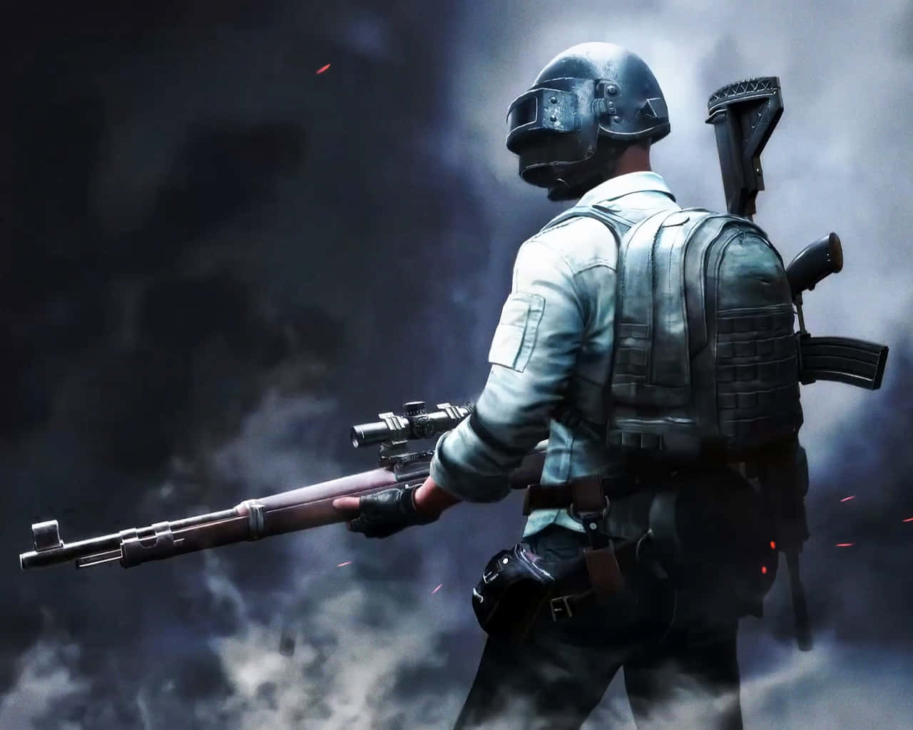Pubg Guns 桌布 壁紙 — 一名身穿戰術裝備的士兵在煙霧彌漫的戰場背景下手持步槍，周圍有發光的餘燼。