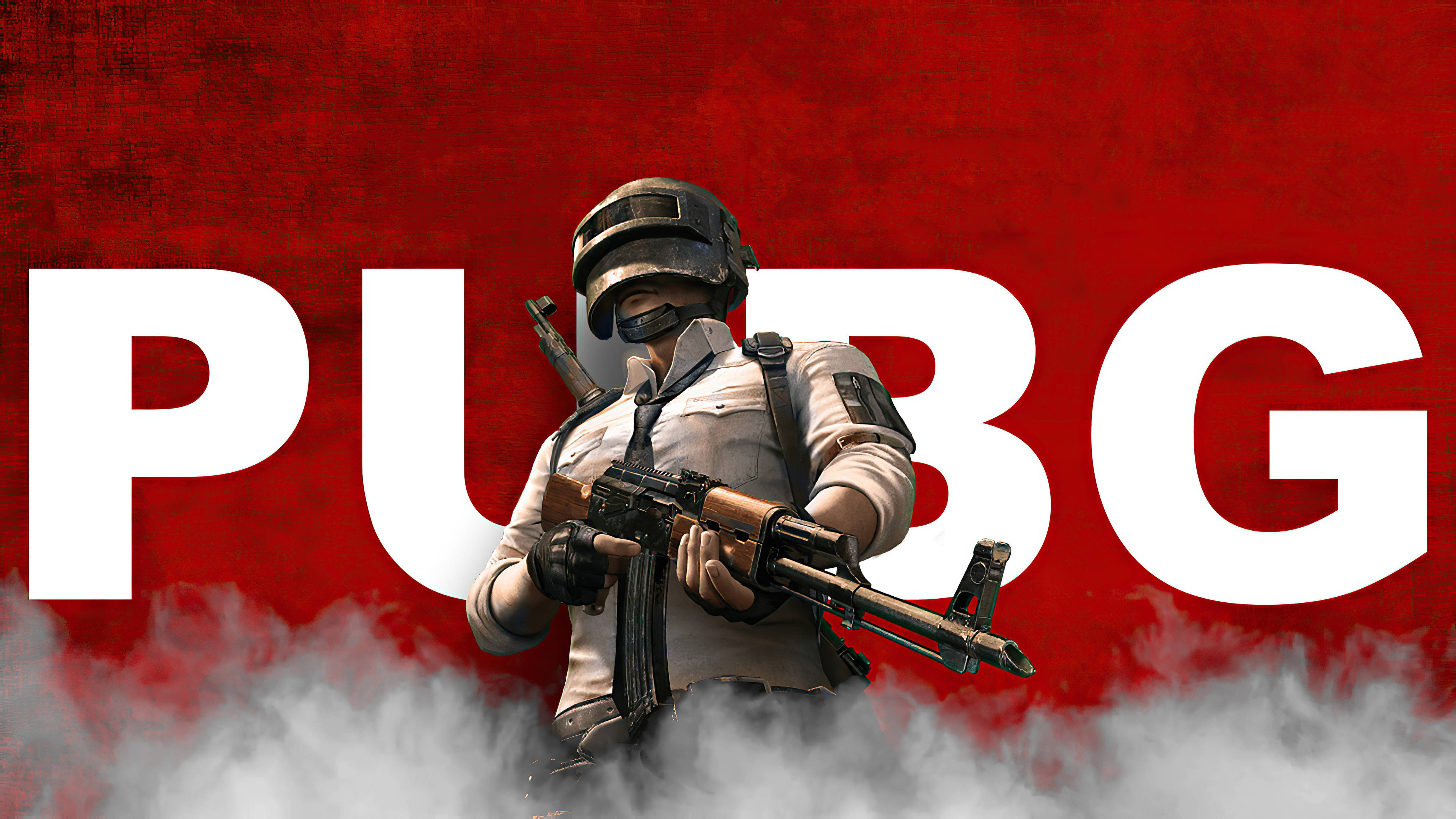 pubg mobile 桌布 壁紙 — 一名身穿戰鬥裝備的士兵在帶有白色 PUBG 字母和煙霧瀰漫地面的醒目紅色背景前手持突擊步槍。