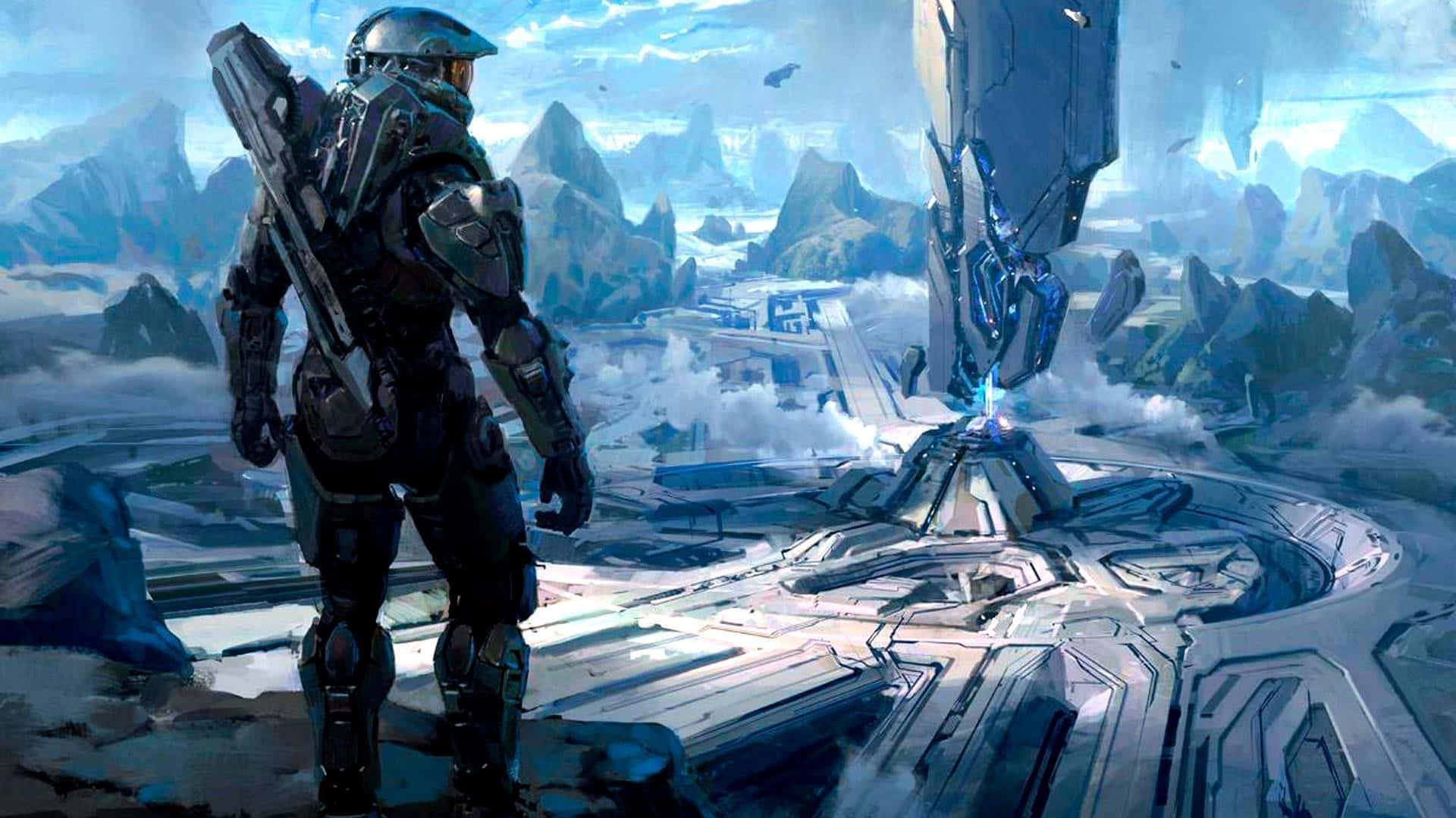 Halo 5 Blue Team 桌布 壁紙 — 一名身穿未來裝甲的士兵站在懸崖上，俯瞰著雲天之下冰封山巒間一座廣闊的科幻城市。