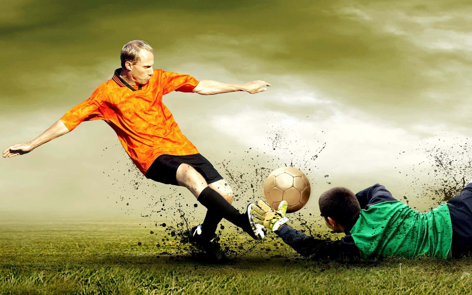 Best Sports 桌布 壁紙 — 一名身穿橙色球衣的足球員踢球，而一名身穿綠色球衣的守門員在草地上撲救。