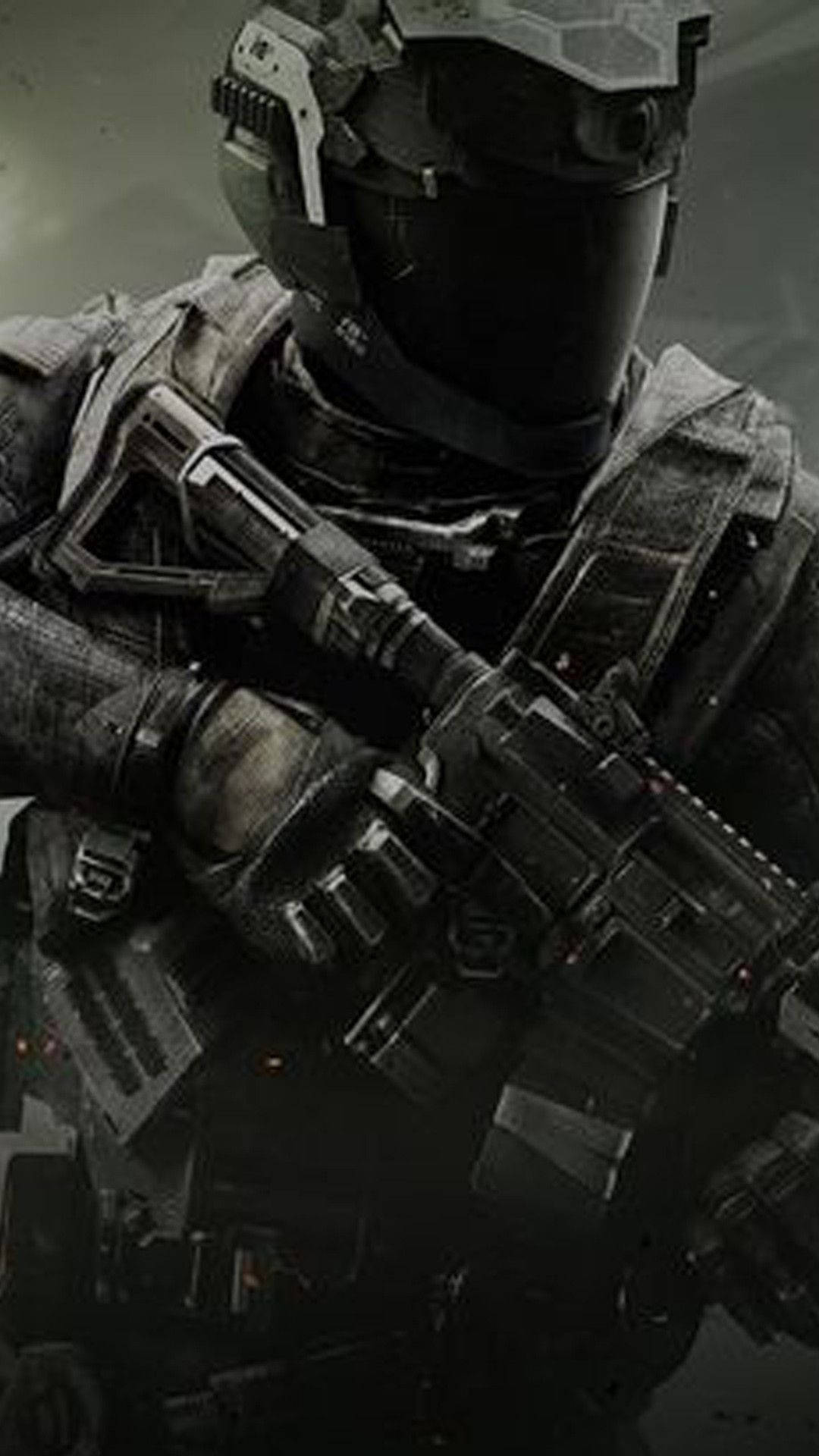 Call Of Duty Modern Warfare iPhone 桌布 壁紙 — 一名身穿深色戰術裝備和頭盔的士兵在陰暗、陰影的環境中手持步槍。