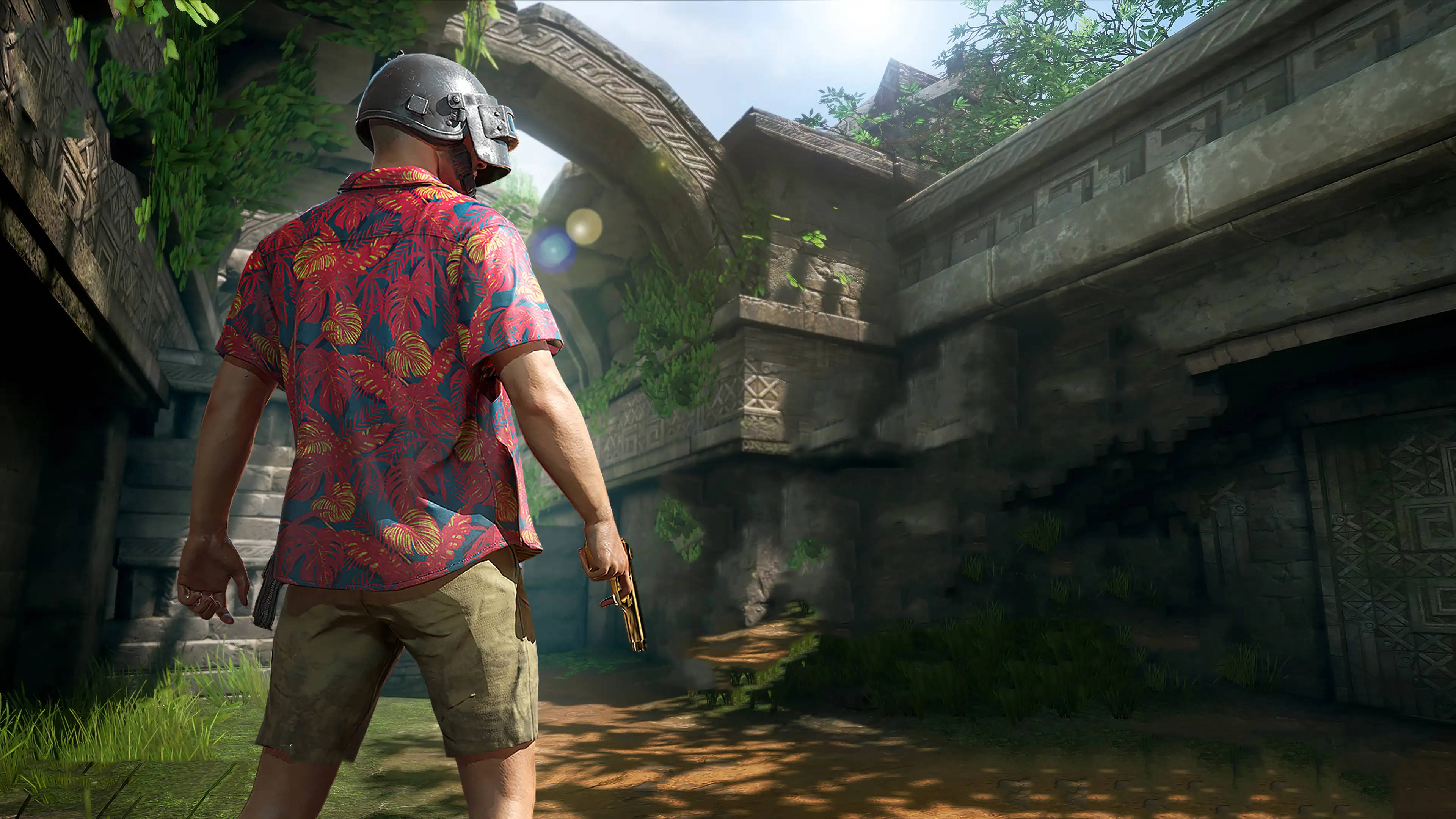 Pc Gaming 桌布 壁紙 — 一名身穿熱帶襯衫的士兵在明亮的日光下穿過雜草叢生的古老廢墟。
