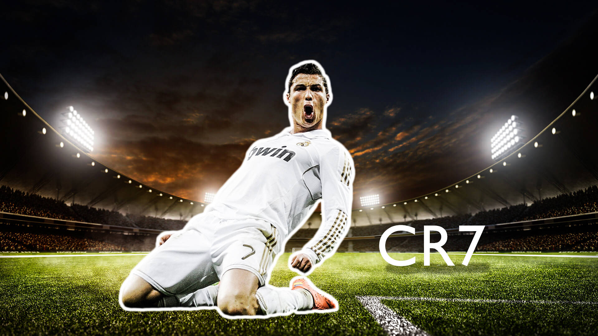 Cristiano Ronaldo 桌布 壁紙 — 一名身穿白色球衣的足球員在球場上跪下，在夜晚明亮的泛光燈下發出勝利的咆哮。