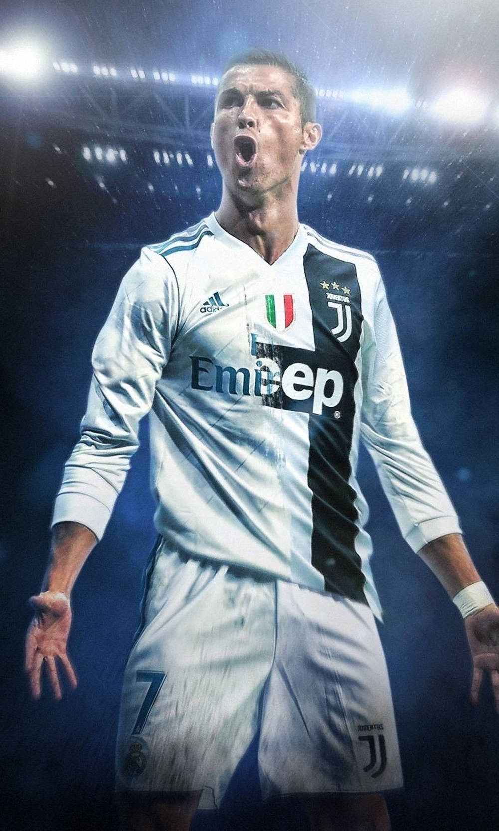 Cristiano Ronaldo 桌布 壁紙 — 一名身穿祖雲達斯球衣的足球員在球場燈光下，雨水灑落四周，發出勝利的咆哮。
