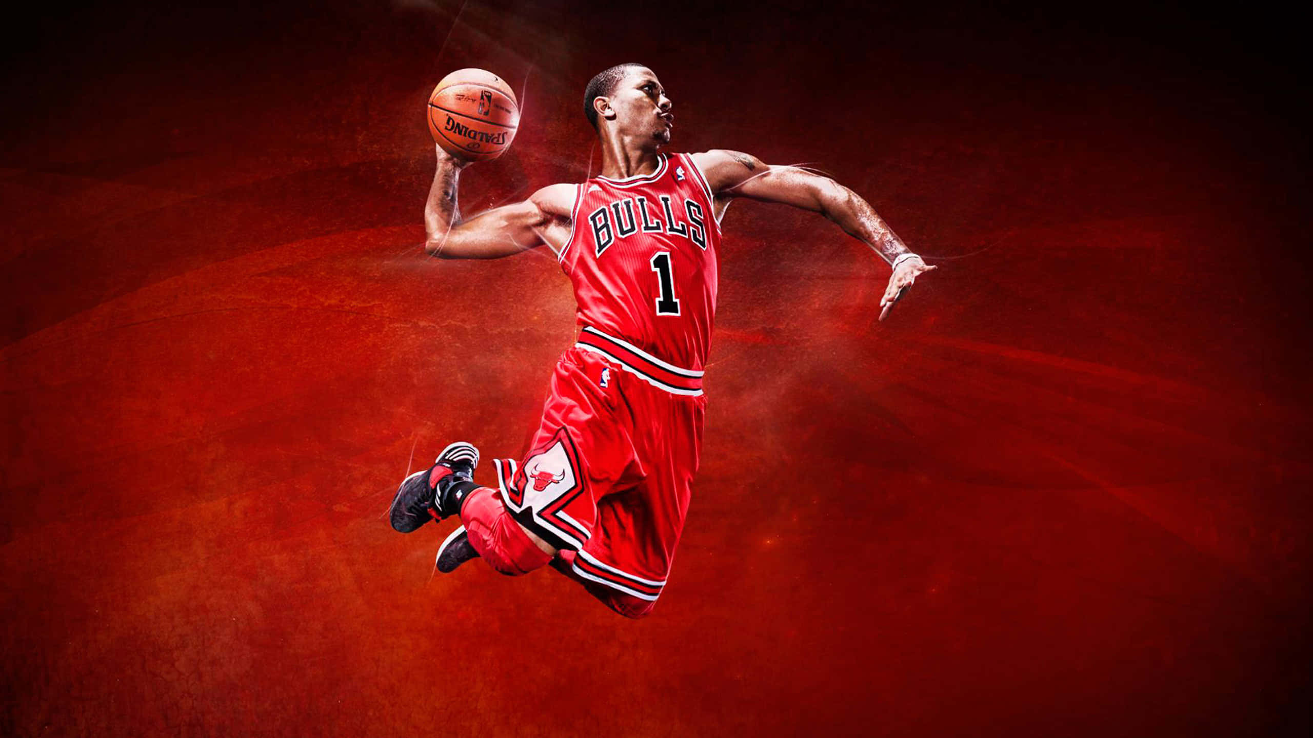 Cool Basketball 桌布 壁紙 — 一名身穿紅色公牛隊球衣的籃球運動員在火紅紋理背景前動態躍起。