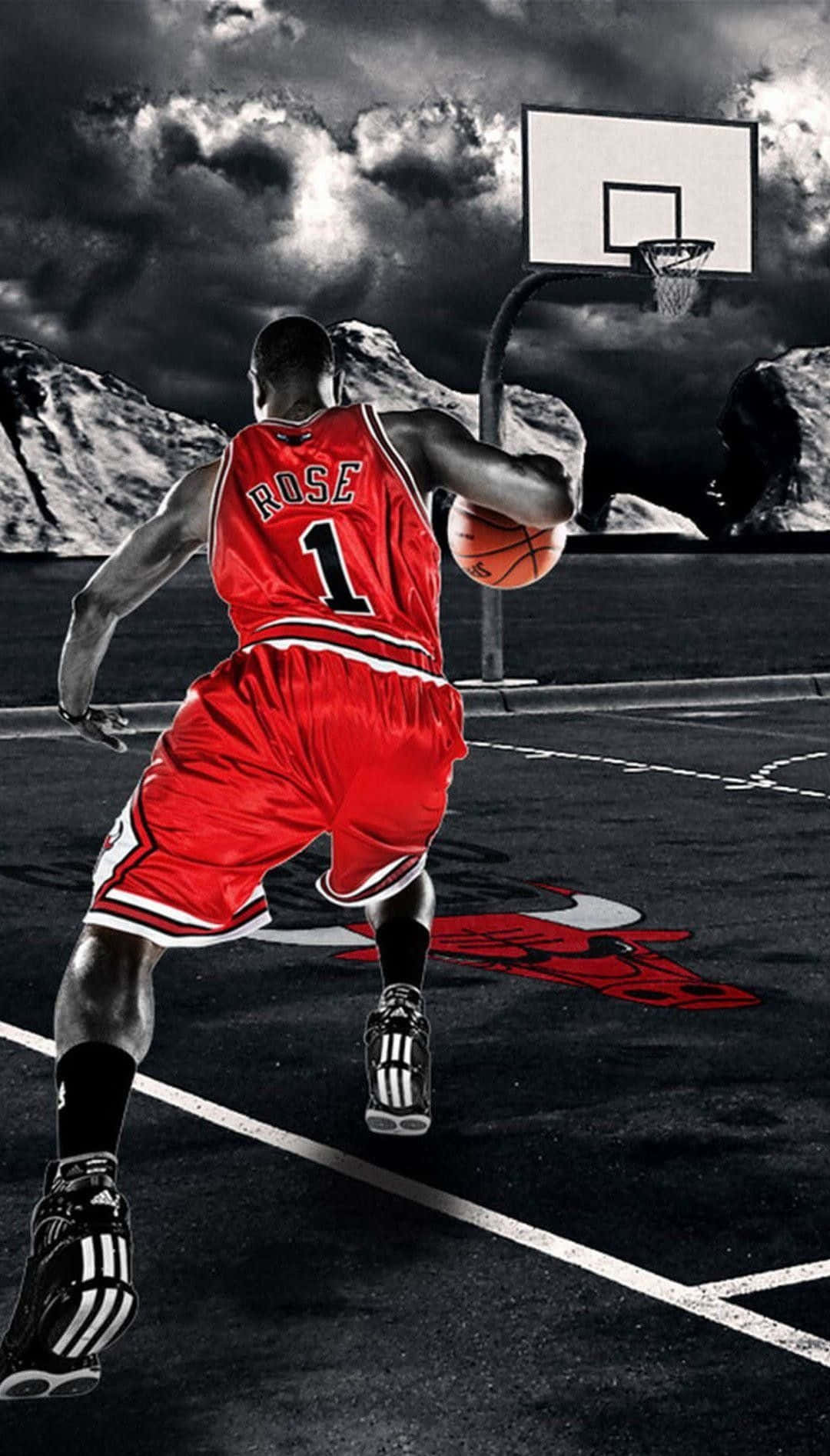 Cool Basketball 桌布 壁紙 — 一名身穿紅色球衣的籃球運動員在戶外球場運球，背景是戲劇性的暴風雲和積雪的山脈。