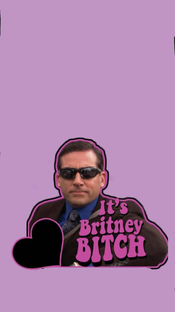 身穿西裝和太陽眼鏡的男子，紫色背景上粉紅色文字「It's Britney BITCH」。 — 辦公室 GIF 壁紙