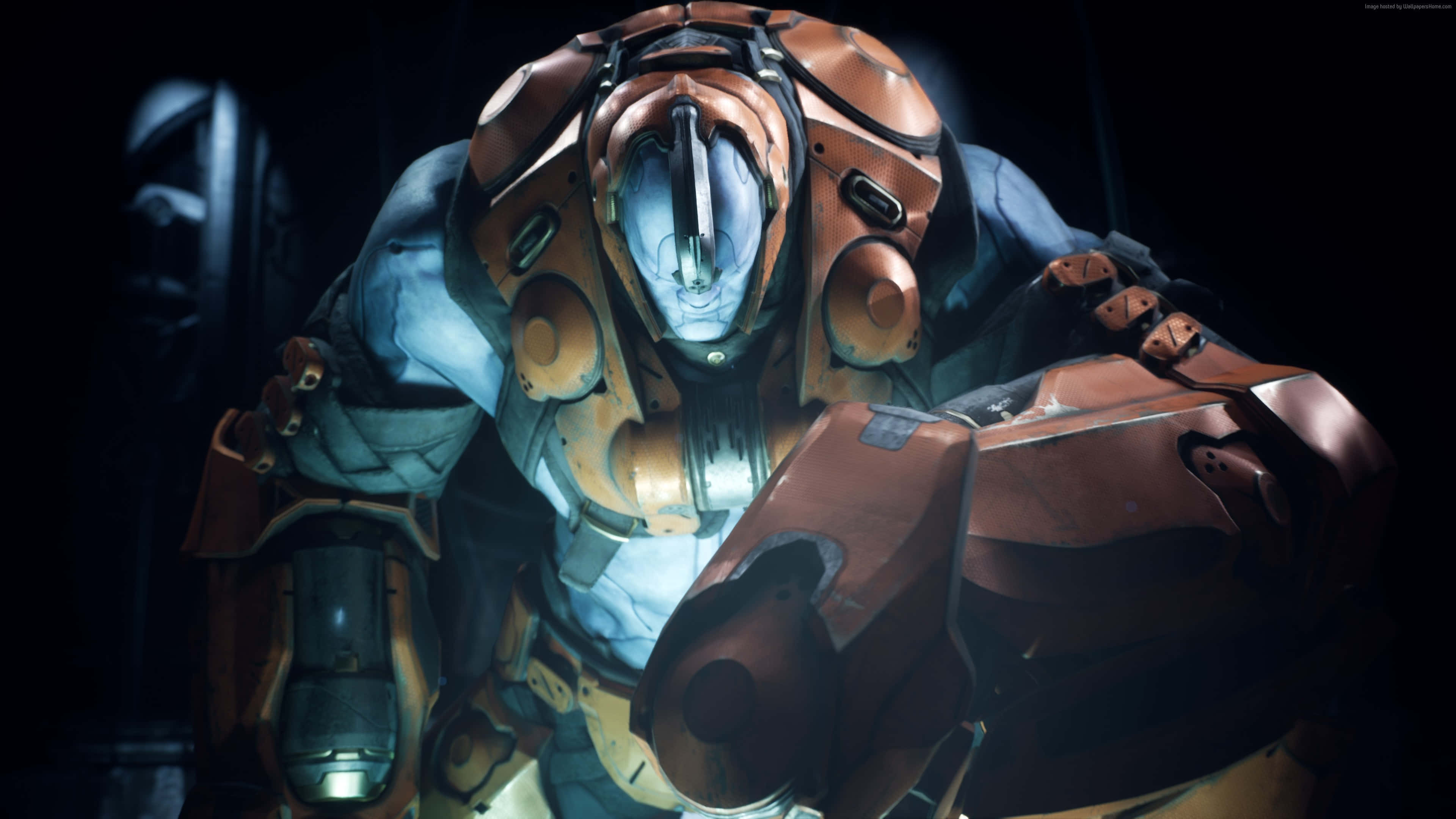 Fallout Brotherhood Of Steel 桌布 壁紙 — 一名身穿重型裝甲的未來戰士，帶有發光藍色護目鏡，站在陰影黑暗中，散發出強烈的力量和神秘感。