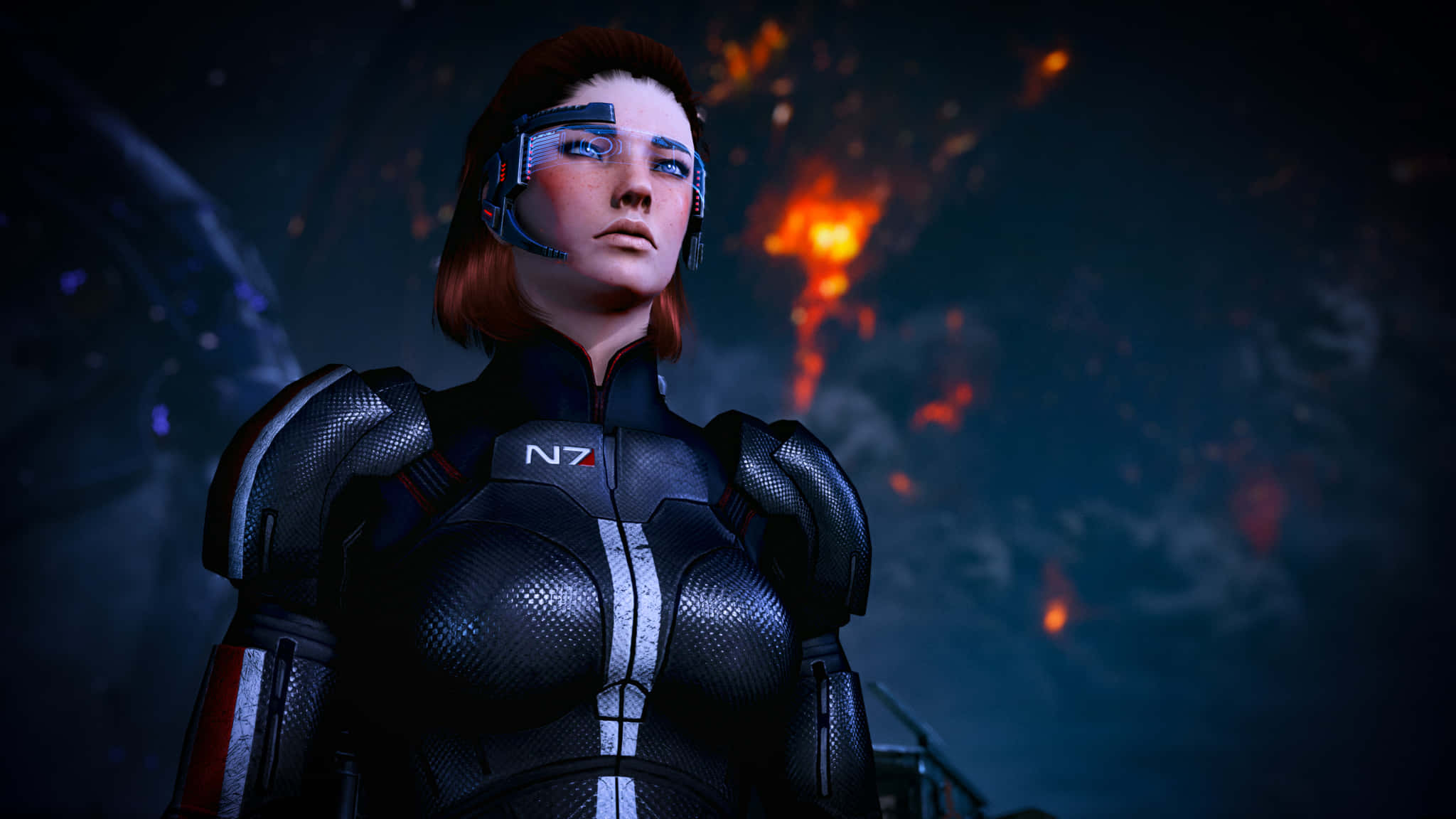 Mass Effect Femshep 桌布 壁紙 — 一名身穿黑色N7裝甲的女兵在黑暗天空下，面對熾熱的外星景觀堅定站立。