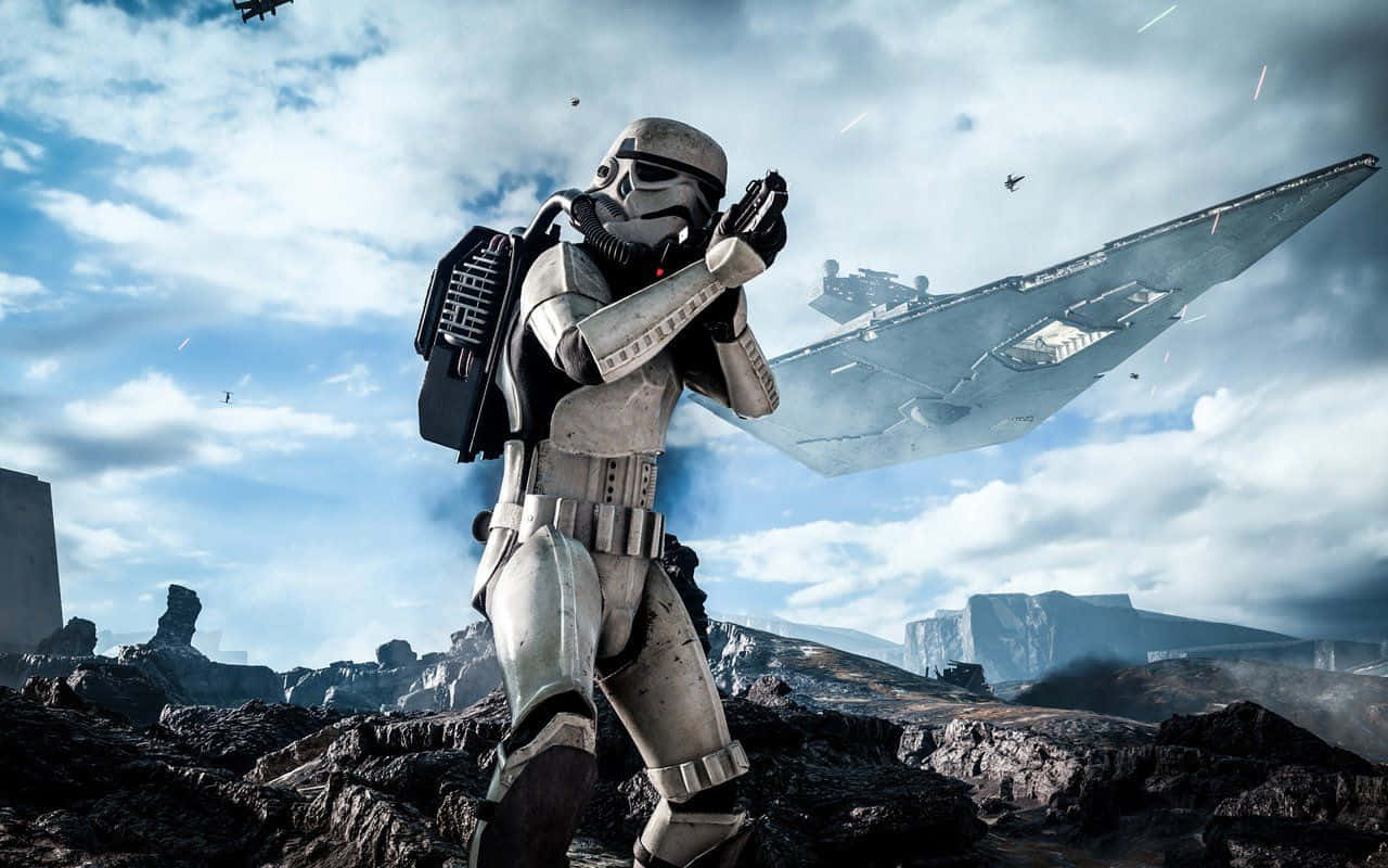 Cool Star Wars 桌布 壁紙 — 一名風暴兵企喺岩石外星行星上準備就緒，而星際毀滅者喺多雲嘅天空中隱現。
