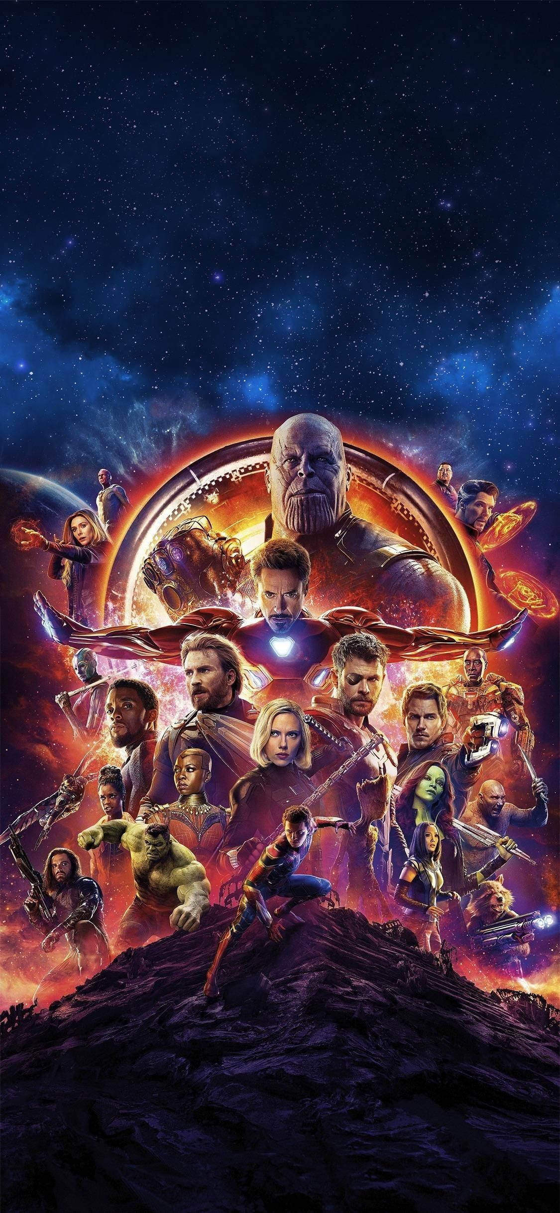 漫威 桌布 壁紙 — 一場宇宙戰鬥場景，以星雲為背景，Marvel 超級英雄與反派對決，Thanos 巨大身影籠罩。