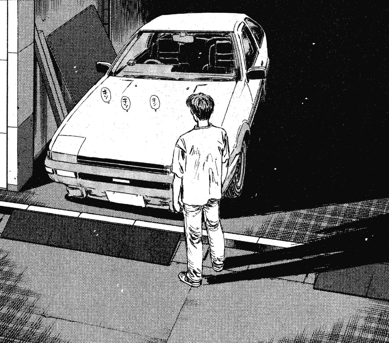 年輕男子在車庫門口夜間看著白色跑車。
