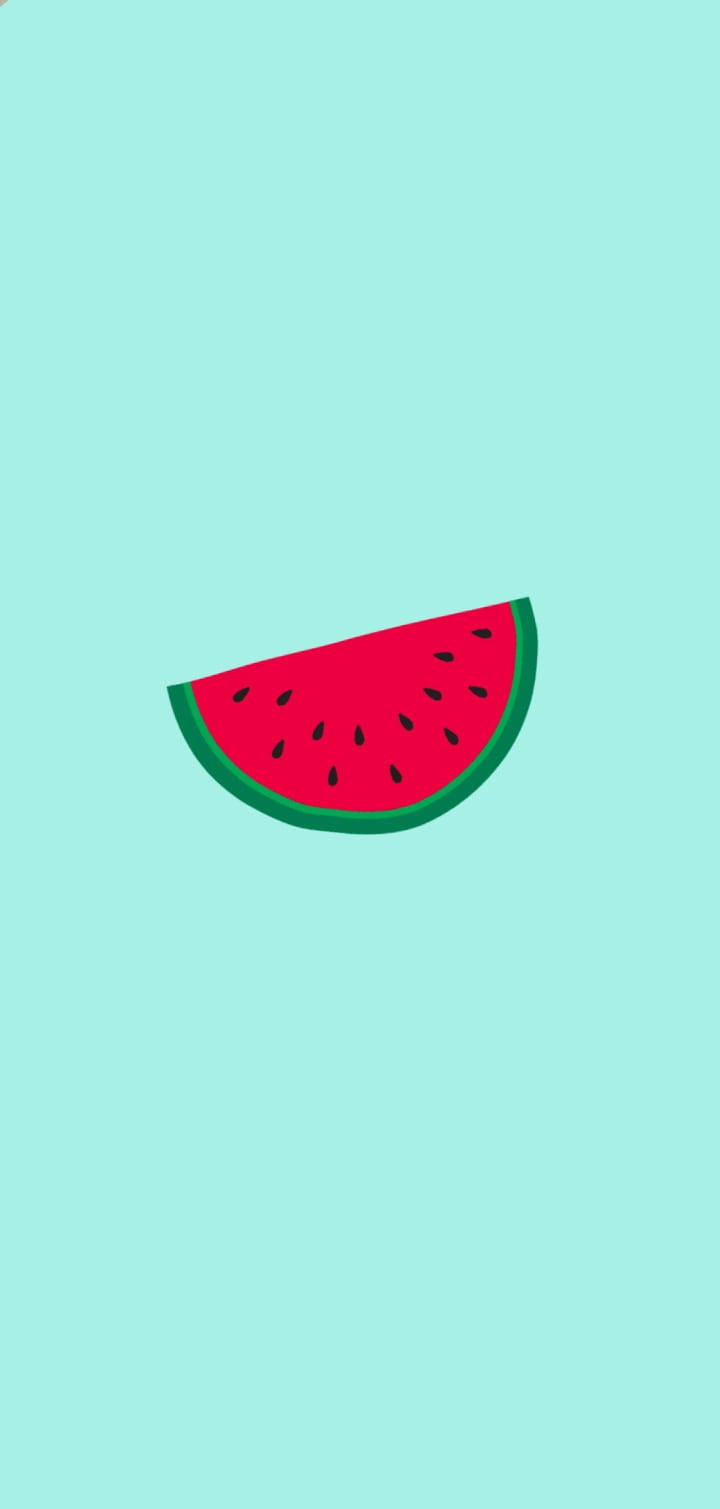 Fruit 桌布 壁紙 — 一塊充滿活力的西瓜片，帶有黑色種子，放置在柔和的薄荷綠色背景上。